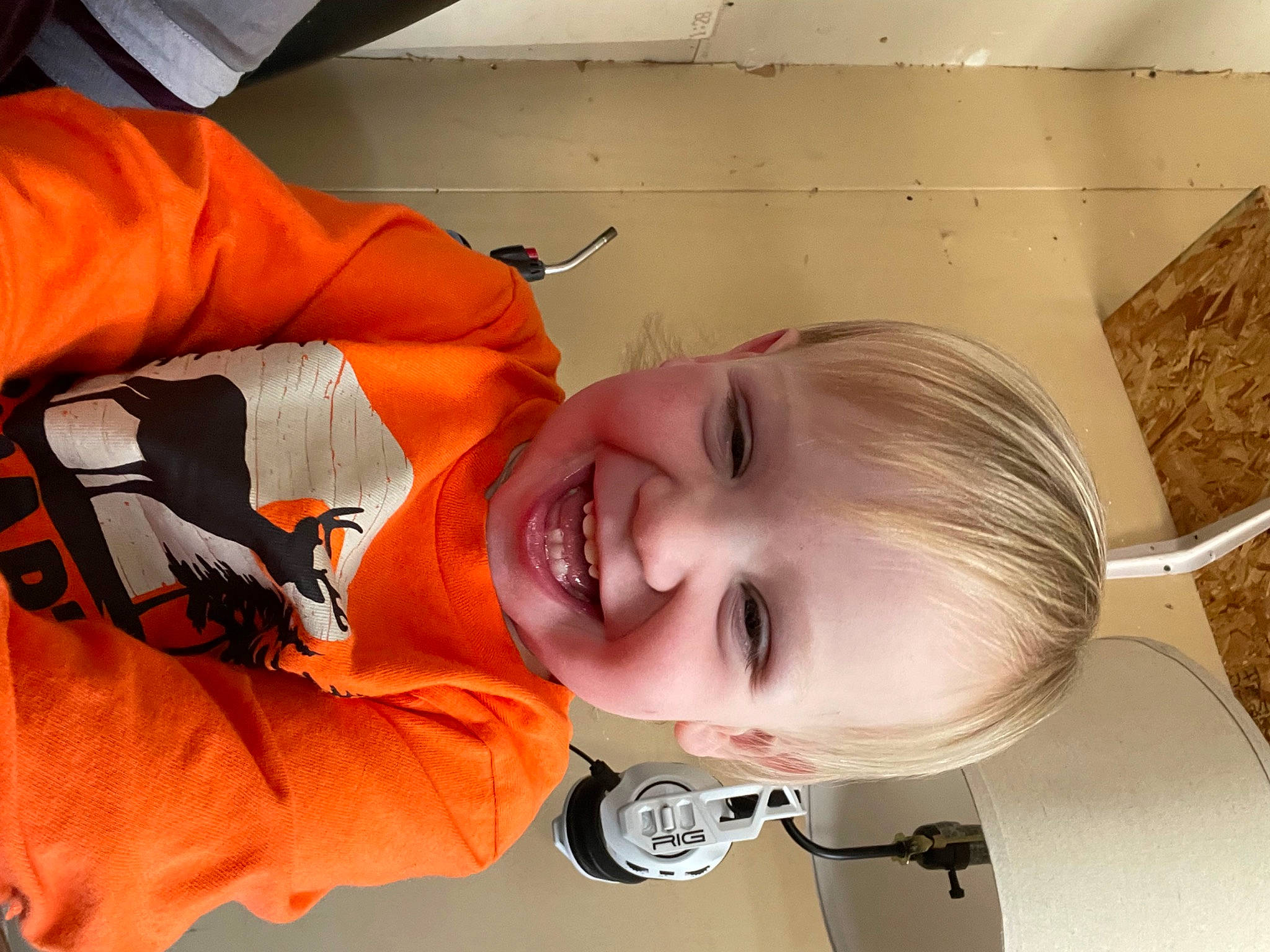 Zephyr is registered to the contest to win money with this photo: baby, baby_products, baby_toddler_clothing, bathing, cheek, child, comfort, eyelash, fun, happy, joy, nose, orange, person, personal_protective_equipment, room, smile, toddler