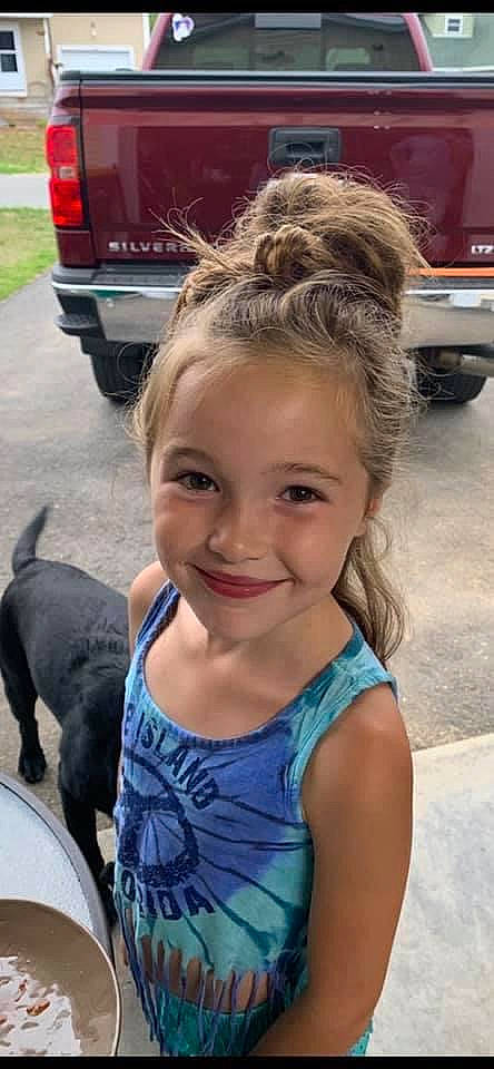 Bayleigh joined the competition — help win amazing prizes! automotive_exterior, automotive_lighting, automotive_mirror, automotive_parking_light, automotive_tail_brake_light, automotive_tire, blond, bumper, canidae, carnivore, companion_dog, dog, dog_breed, fender, joy, mammal, motor_vehicle, person, smile, vehicle_door