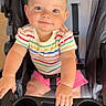 Ella-Grey joined the competition — help win amazing prizes! baby, child, stroller, seatbelt, smiling, striped_shirt, pink_shorts, hands, face, blue_eyes, indoor, person, cute, infant, happy, portrait, seated, baby_clothing, baby_toy_holder, baby_accessory