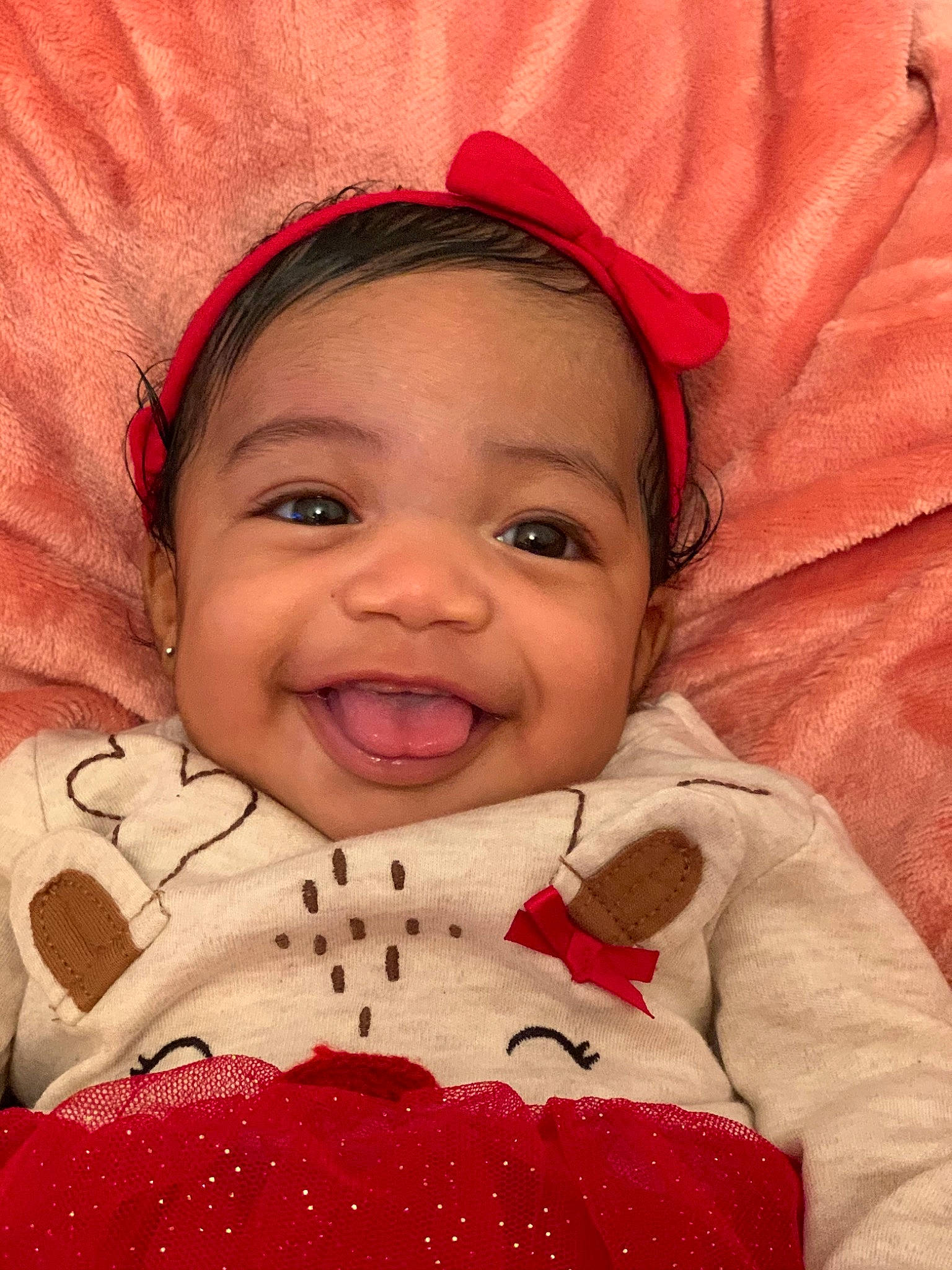 Aiyana is registered to the contest to win money with this photo: baby_toddler_clothing, cheek, child, eye, eyebrow, eyelash, facial_expression, forehead, happy, headgear, iris, joy, lip, mouth, organ, person, pink, red, sleeve, textile