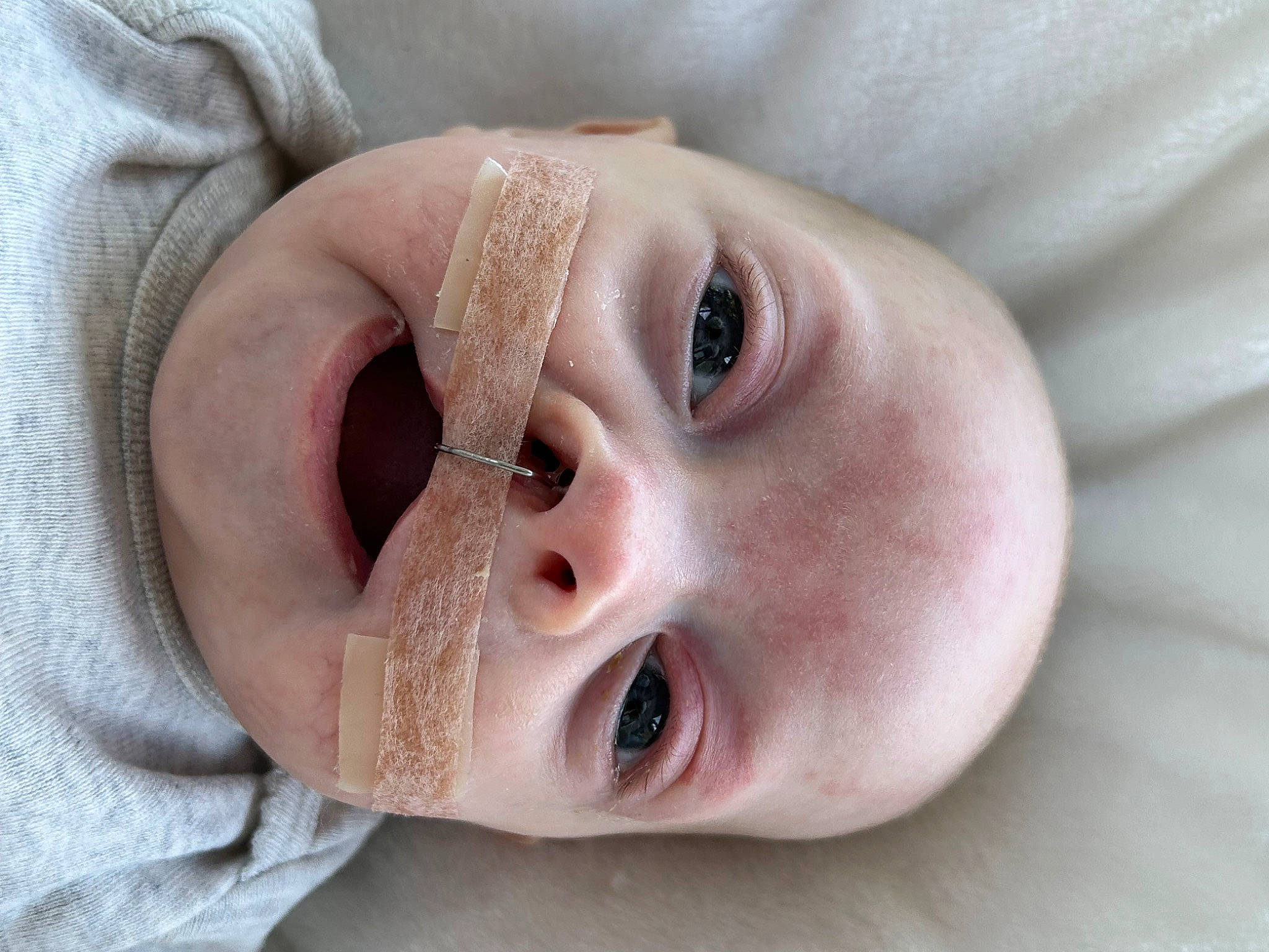 Saylor joined the competition — help win amazing prizes! baby, baby_toddler_clothing, cheek, close_up, comfort, ear, eyebrow, eyelash, finger, happy, iris, jaw, lip, mouth, neck, no_expression, nose, person, skin, toddler