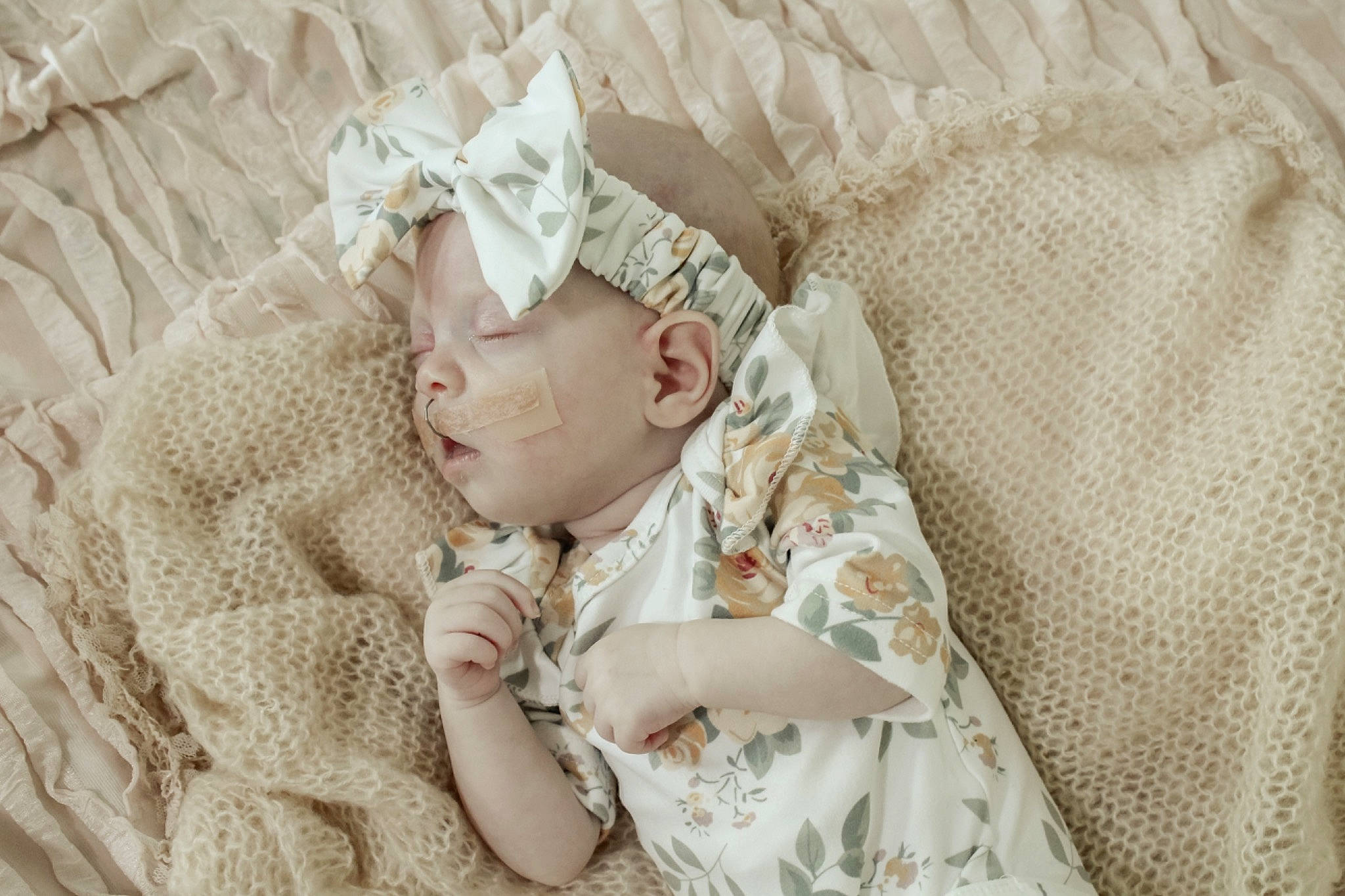 Saylor is registered to the contest to win money with this photo: art, baby, baby_sleeping, baby_toddler_clothing, bedding, beige, child, collar, comfort, fashion_accessory, linens, pattern, peach, person, portrait_photography, skin, sleeve, toddler