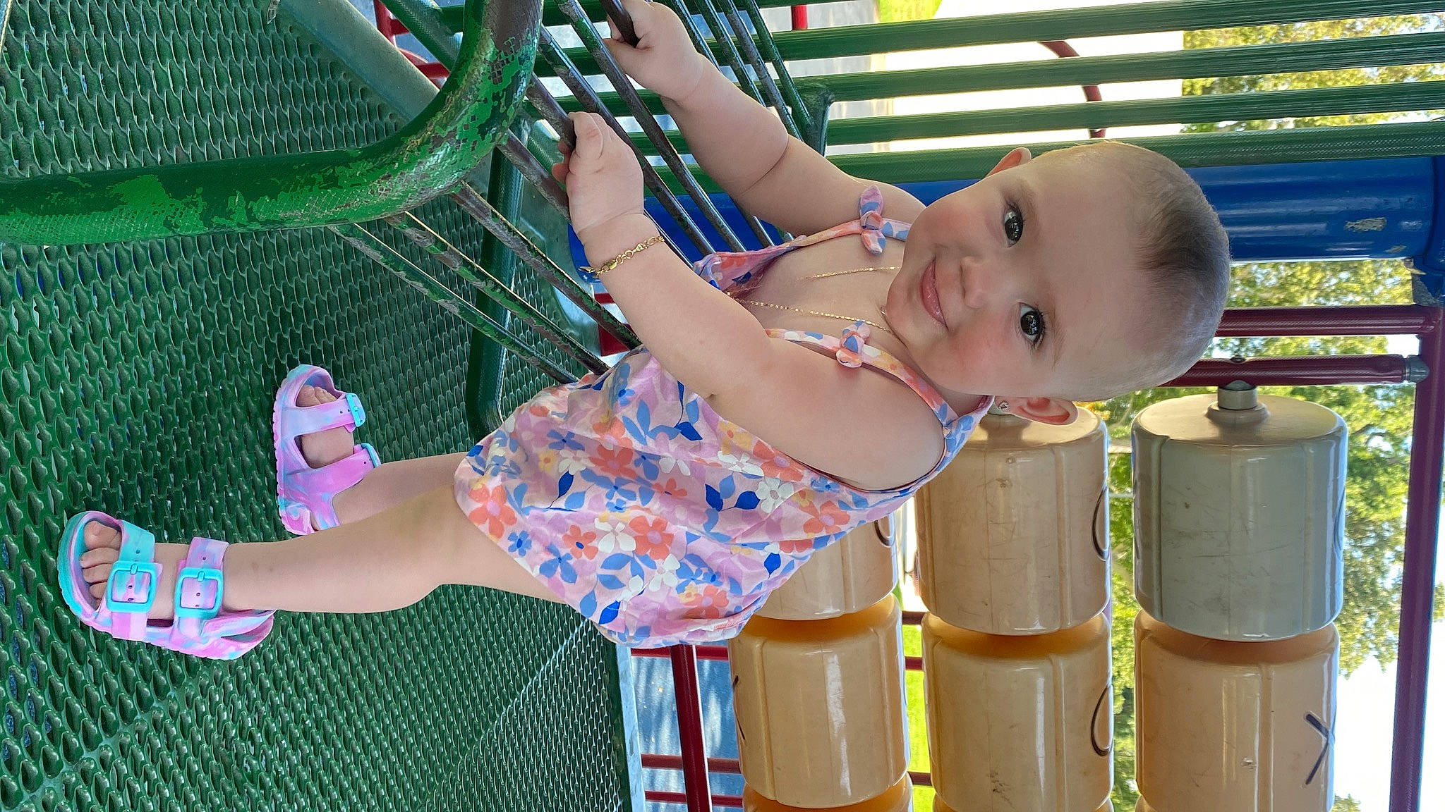Emiliana joined the competition — help win amazing prizes! baby, baby_toddler_clothing, child, dress, facial_expression, fun, grass, green, happy, joy, leisure, person, play, product, public_space, recreation, sandal, skin, smile, thigh