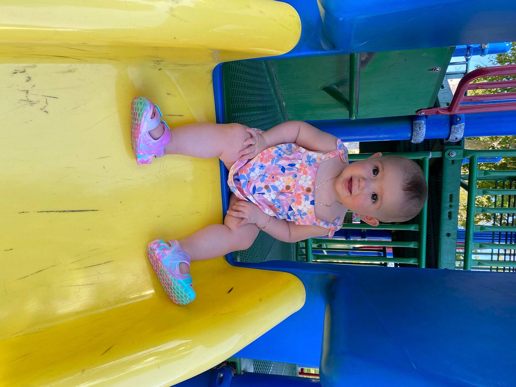 Emiliana joined the competition — help win amazing prizes! baby, baby_toddler_clothing, blue, bumper, child, chute, city, electric_blue, fun, games, leisure, outdoor_play_equipment, paint, person, plastic, play, playground, recreation, smile, t_shirt