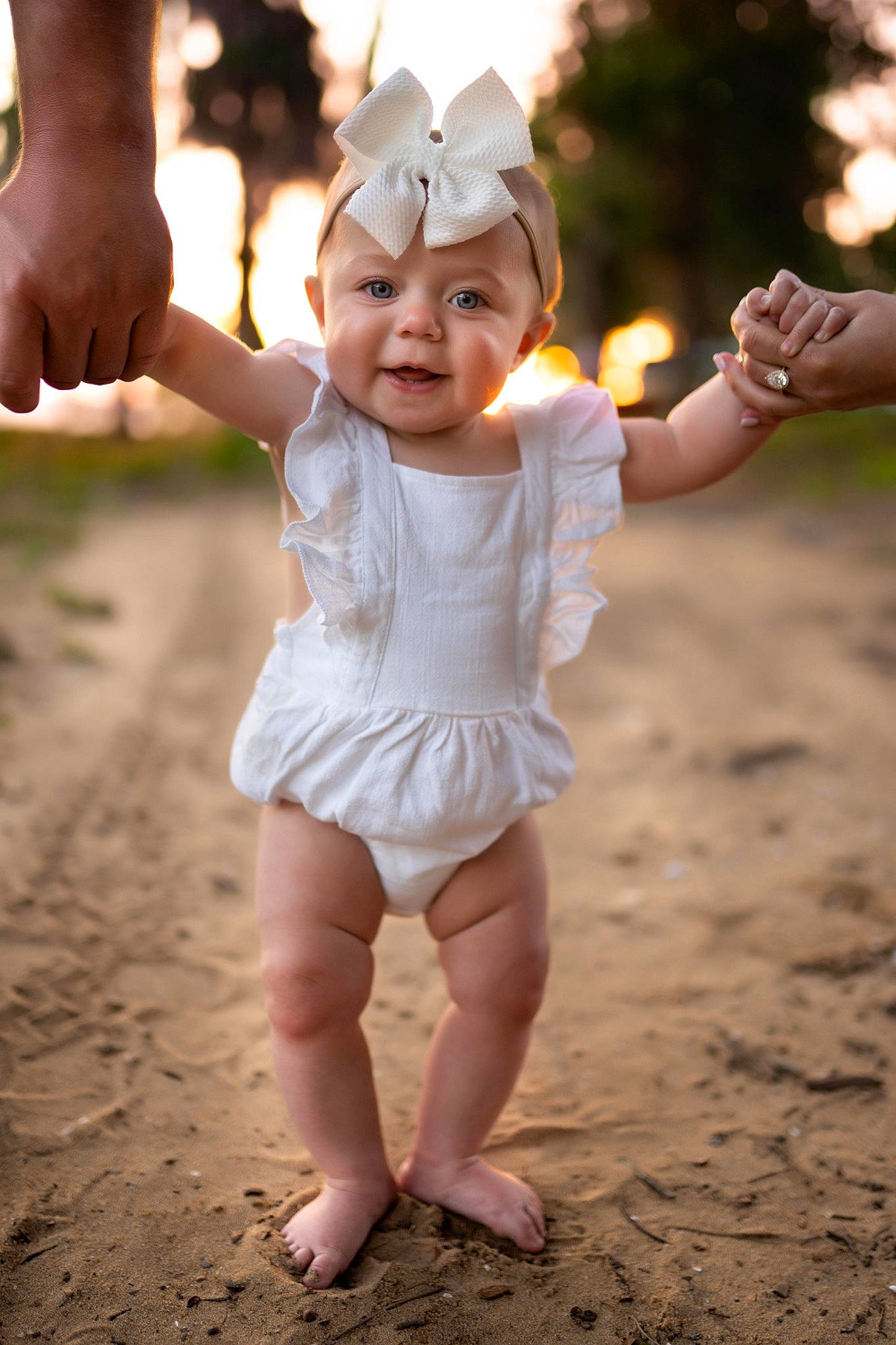 Whitley is registered to the contest to win money with this photo: baby, baby_toddler_clothing, face, facial_expression, finger, flash_photography, fun, gesture, grass, hand, happy, headwear, joy, people, people_in_nature, person, playing_with_kids, skin, sleeve, smile
