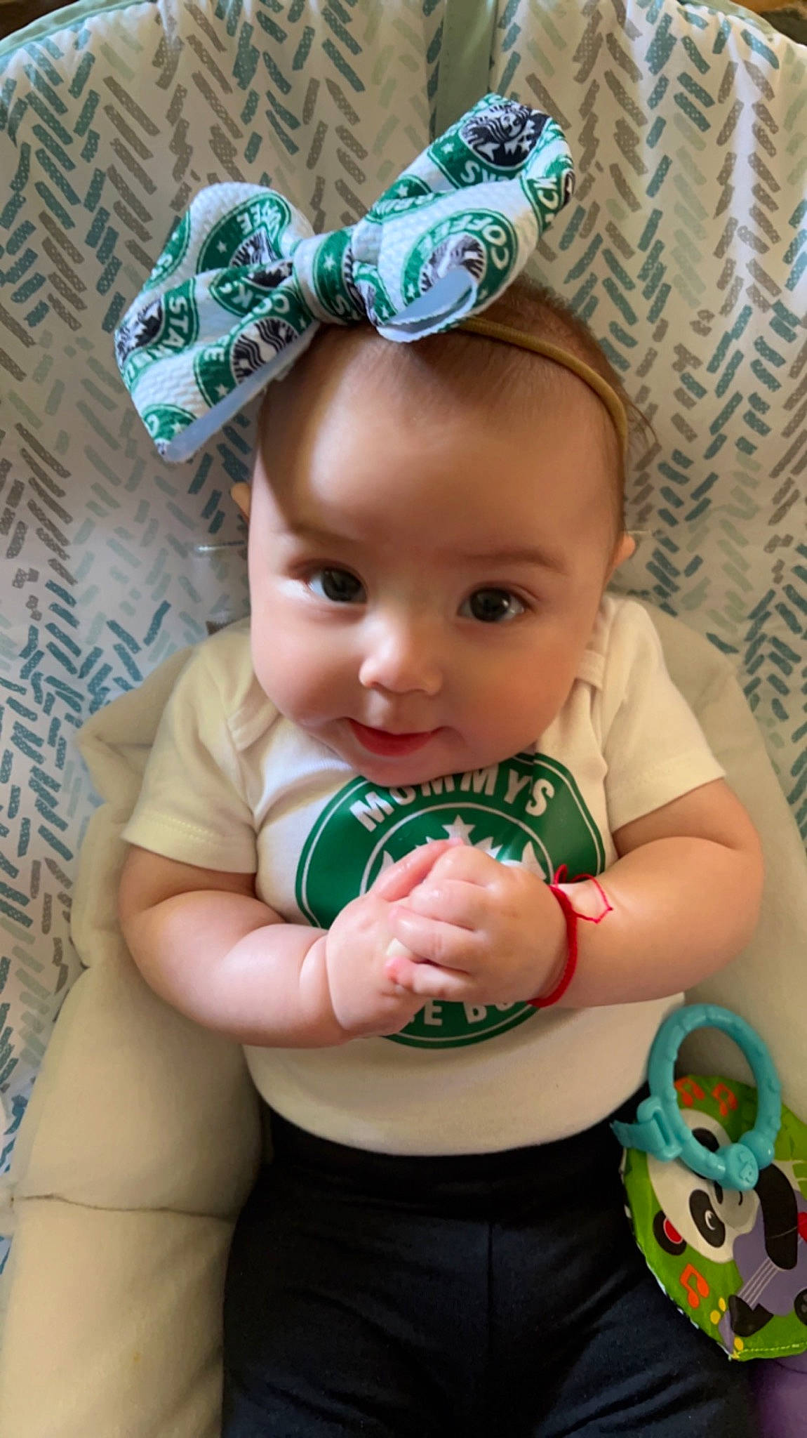 Lucia joined the competition — help win amazing prizes! baby, baby_toddler_clothing, blue, cheek, child, costume_hat, eye, finger, fun, gesture, green, hand, happy, head, jewellery, organ, person, pink, skin, sleeve