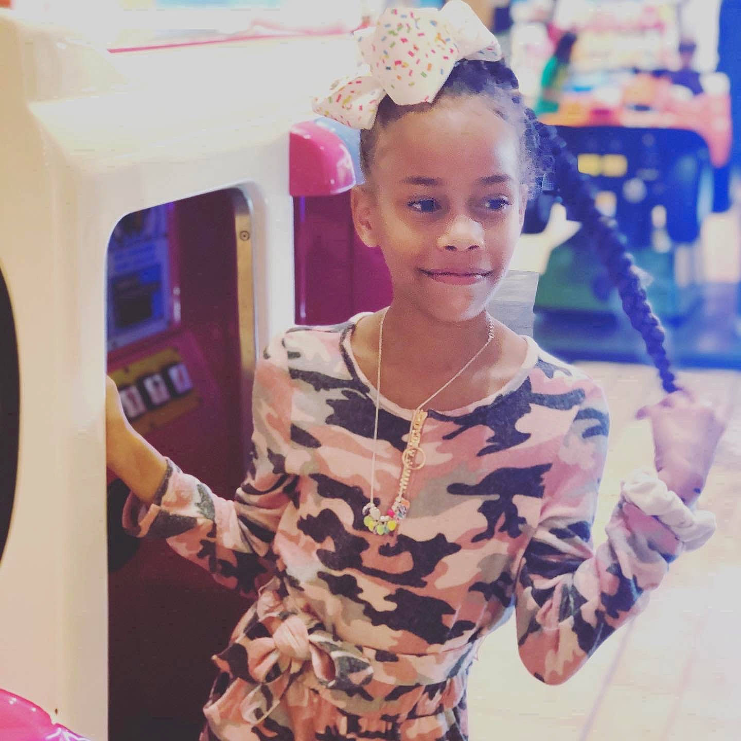 Alaysia joined the competition — help win amazing prizes! body_jewelry, child_model, day_dress, hair_accessory, hair_tie, headband, headpiece, jewellery, joy, person, pigtail