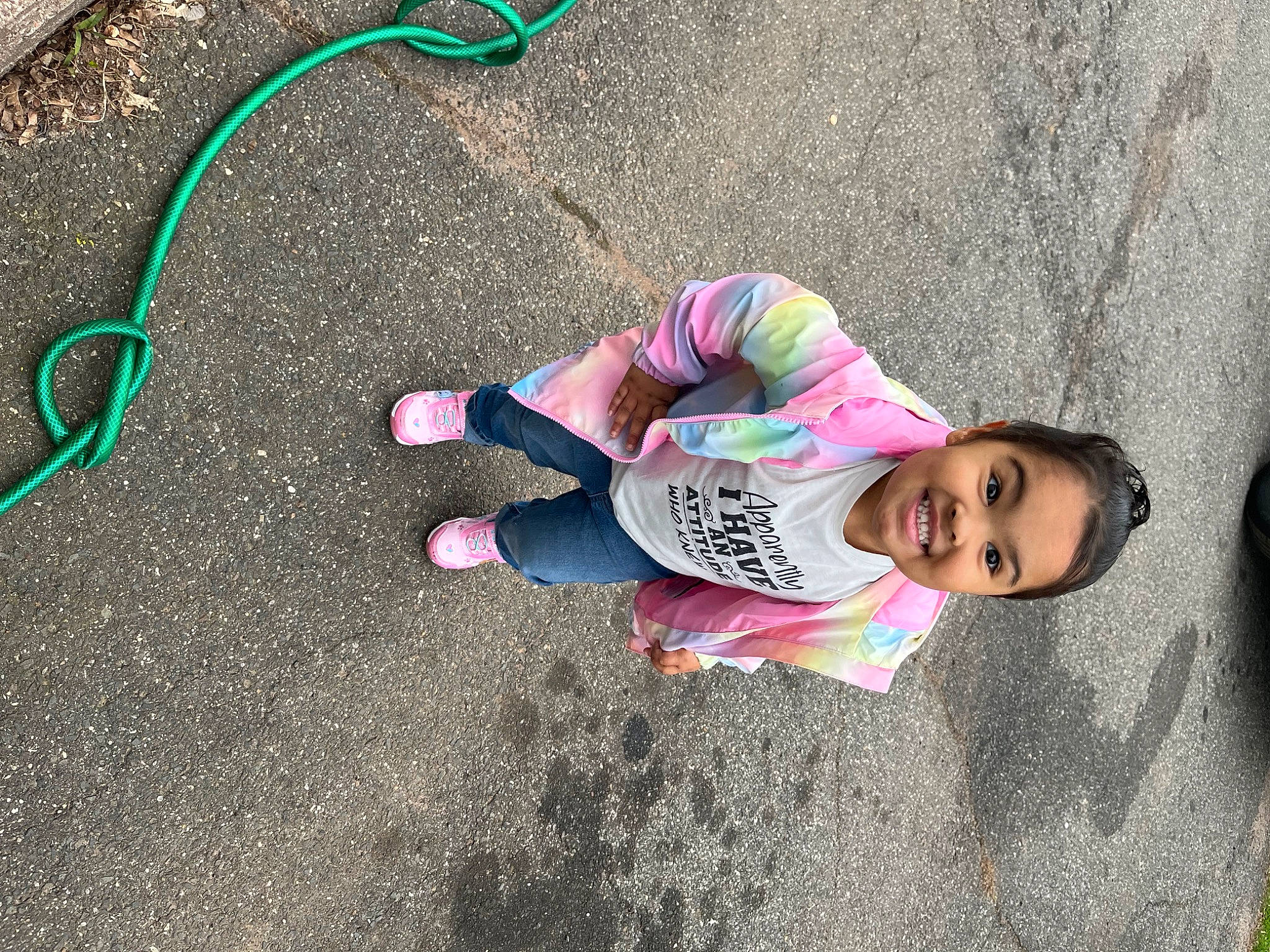 Khamiyah is registered to the contest to win money with this photo: asphalt, child, city, concrete, cool, fun, grass, happy, joy, leisure, person, pink, play, recreation, road_surface, shoe, sidewalk, smile, sneakers, t_shirt
