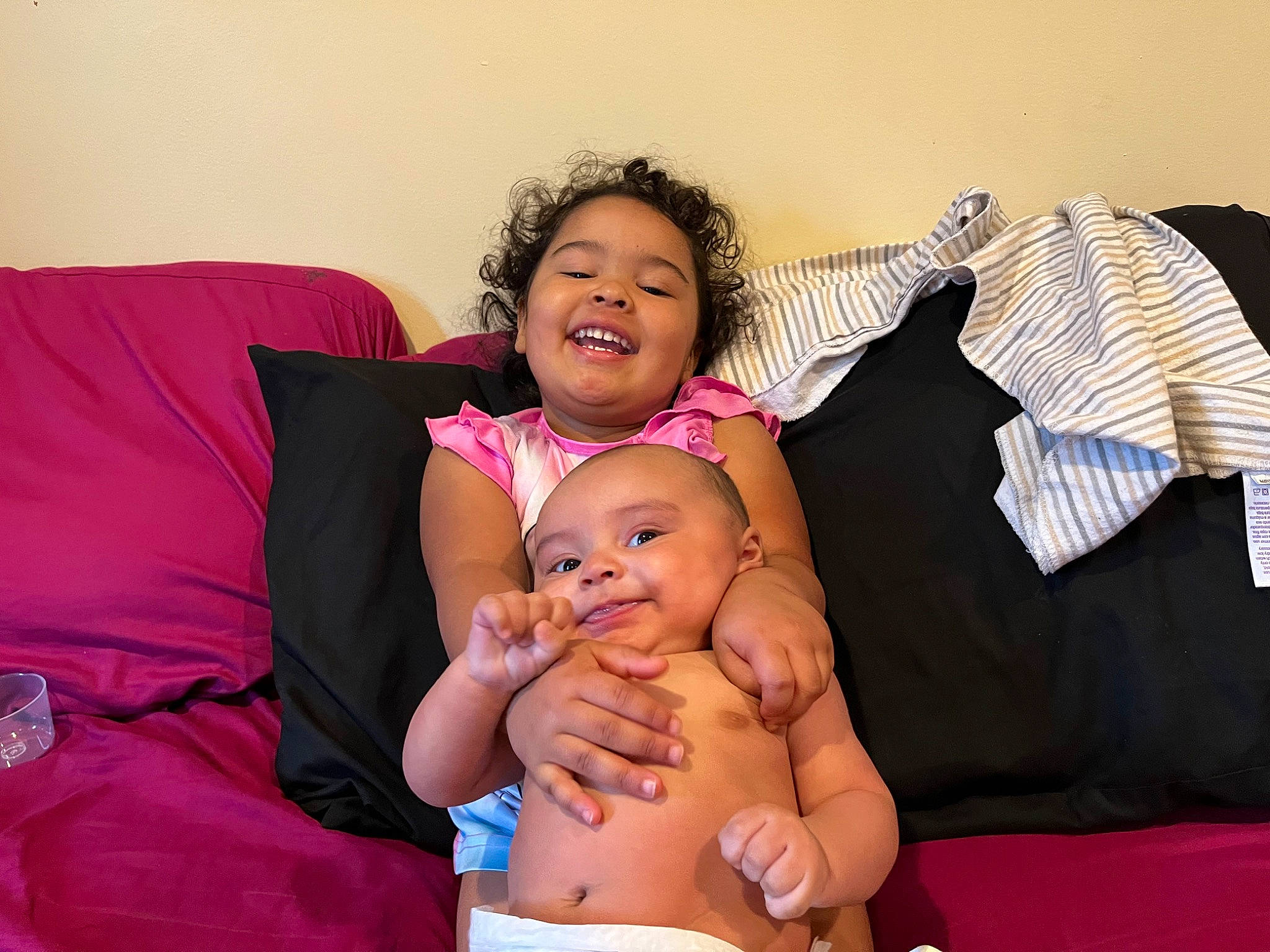 Khavarii joined the competition — help win amazing prizes! arm, baby, barefoot, comfort, finger, gesture, happy, headwear, joint, joy, leg, person, pillow, pink, playing_with_kids, purple, shoulder, skin, smile, stomach