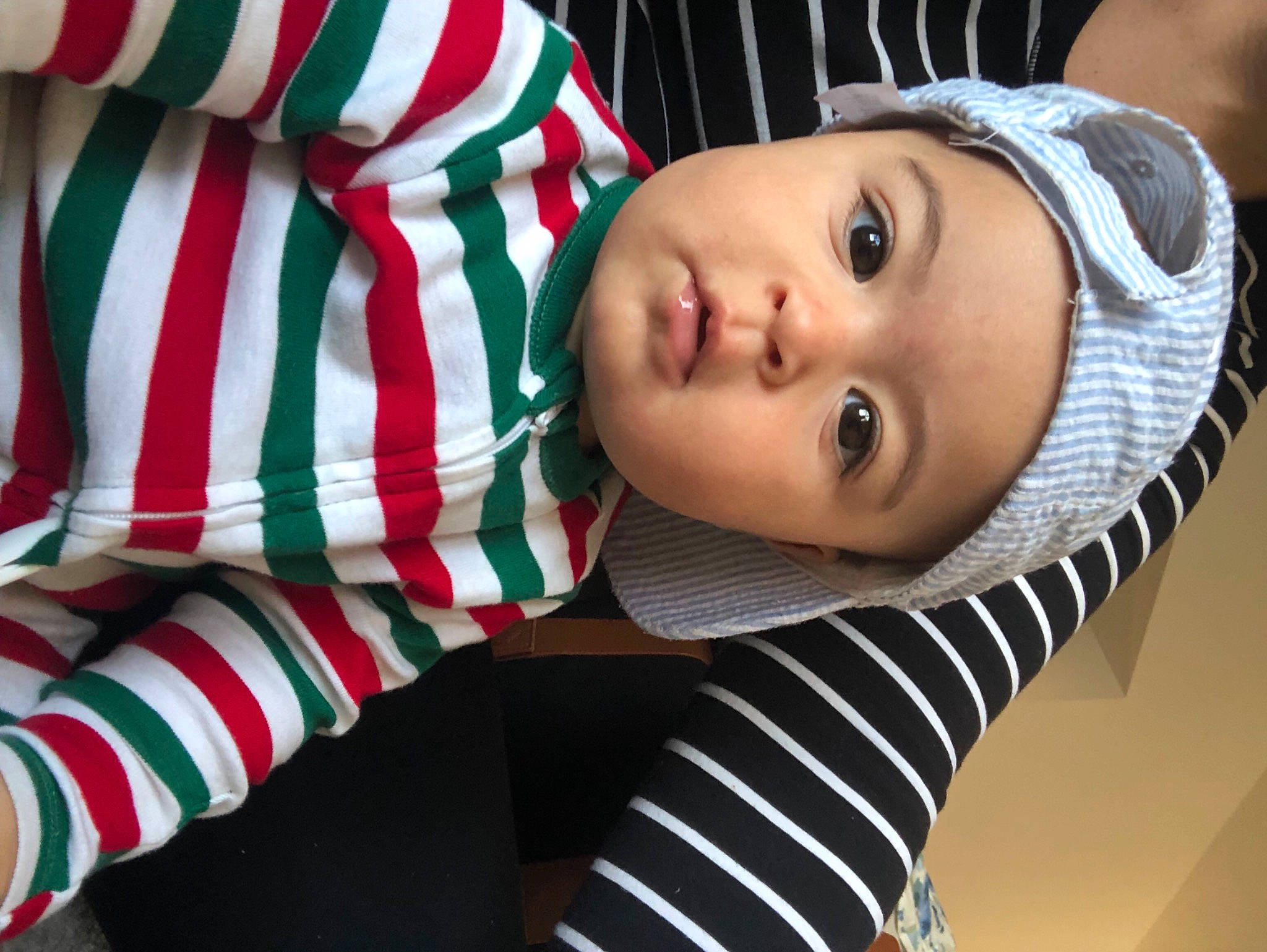 Evren joined the competition — help win amazing prizes! baby, baby_toddler_clothing, cap, carmine, child, comfort, eyelash, flag_day_usa, flag_of_the_united_states, happy, hat, headwear, leisure, lip, outerwear, pattern, person, plaid, sitting, sleeve