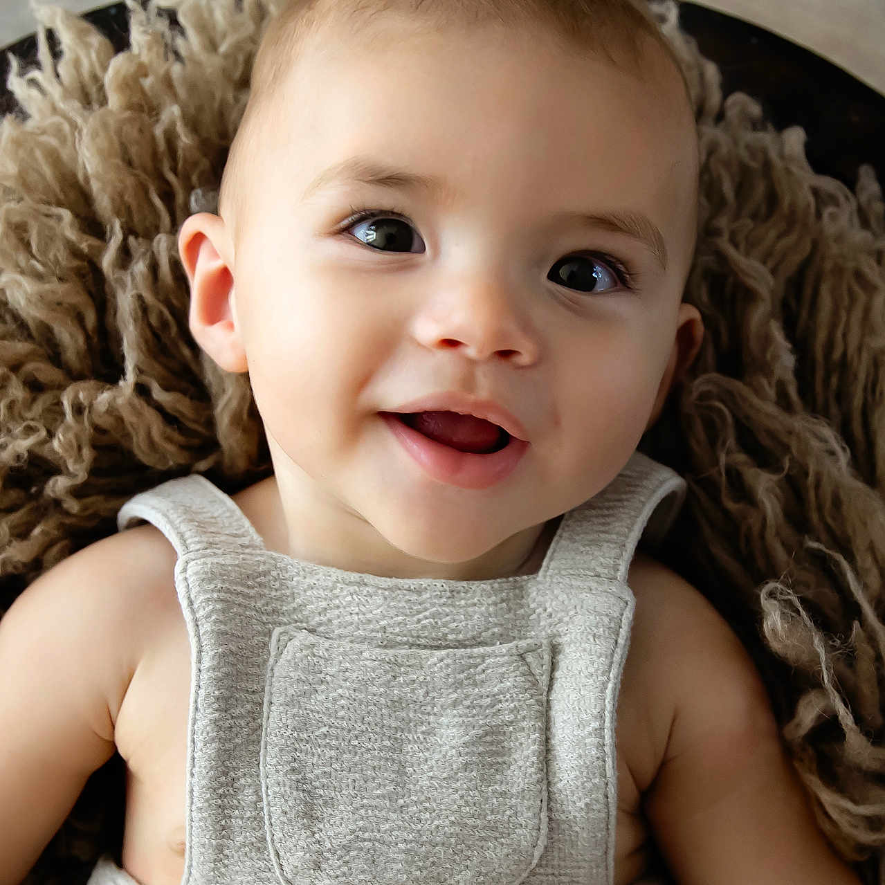 Kolton is registered to the contest to win money with this photo: baby, babylaughing, blonde, bodypart, face, finger, hair, hand, happy, head, homedecor, laughing, mouth, newborn, person, photography, portrait, sitting, smile