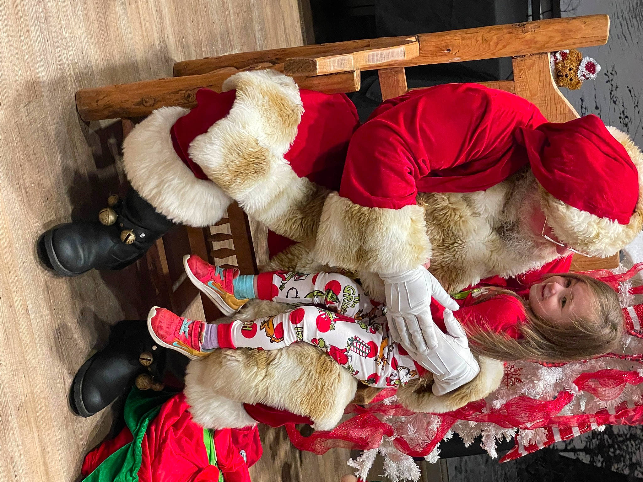 Rachel is registered to the contest to win money with this photo: bovine, carmine, christmas, christmas_eve, companion_dog, event, fawn, fictional_character, fur, fur_clothing, holiday, joy, livestock, person, plush, red, santa_claus, stuffed_toy, tail, toy