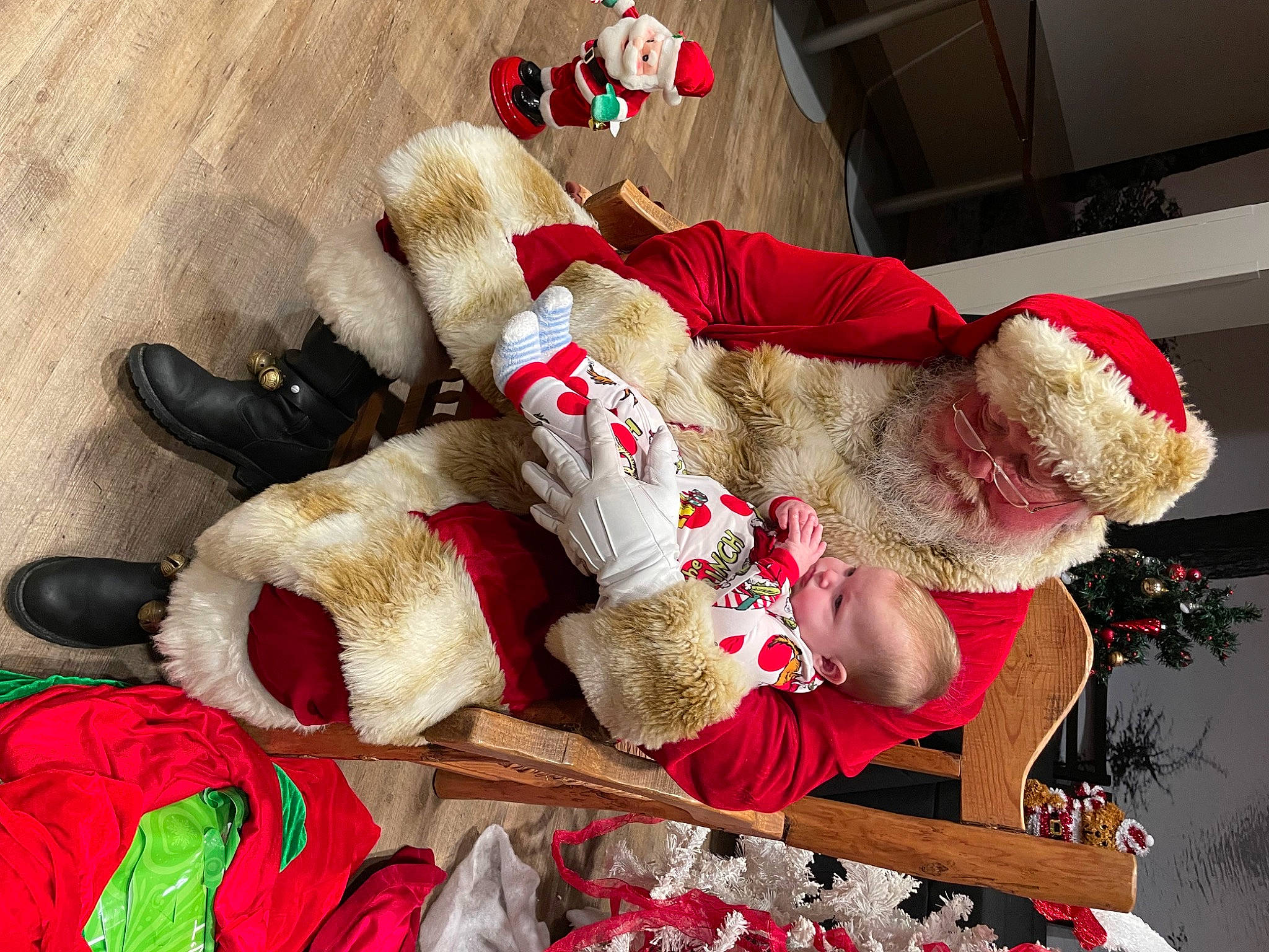 Katie joined the competition — help win amazing prizes! carmine, christmas, christmas_decoration, christmas_eve, costume, event, fawn, flooring, fur, fur_clothing, holiday, lap, person, plush, red, room, santa_claus, stuffed_toy, toy, tradition