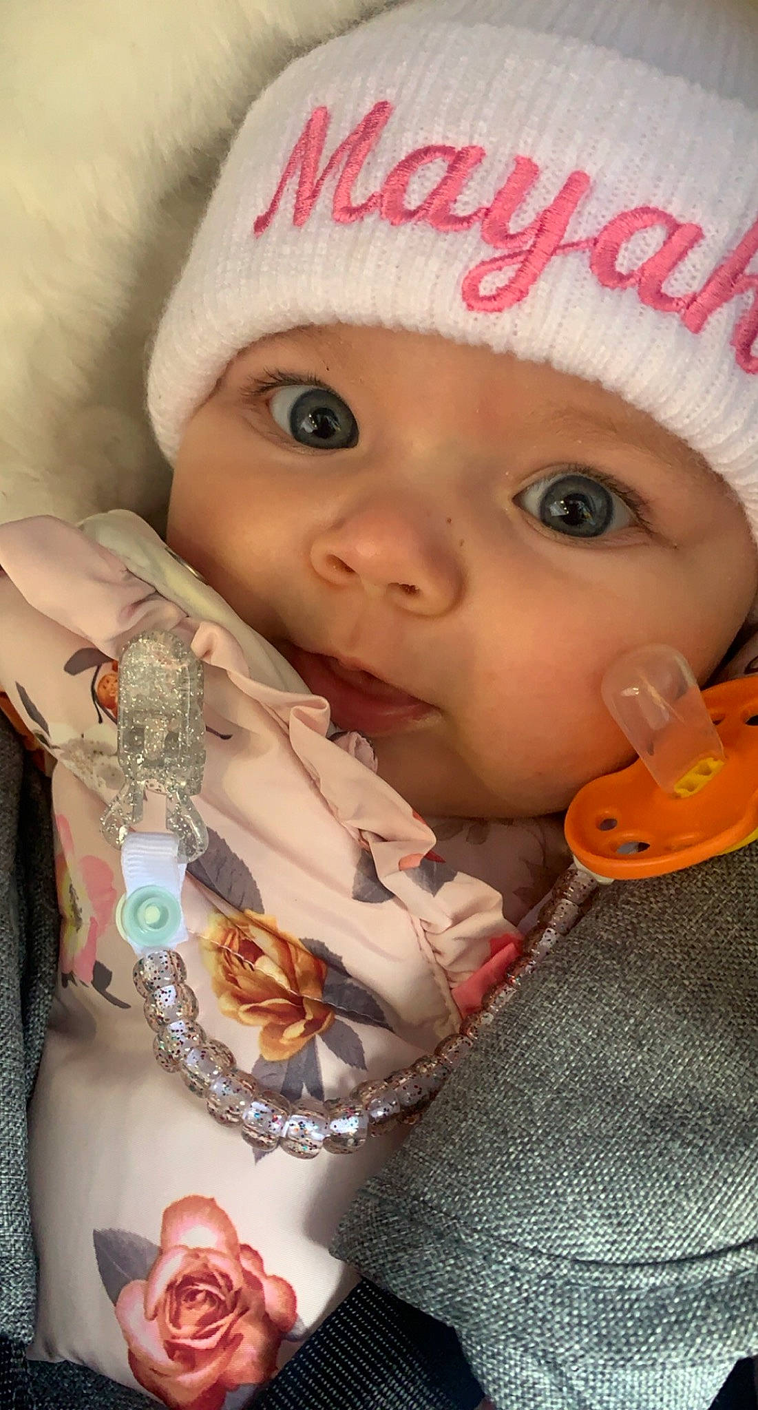 Mayah is registered to the contest to win money with this photo: baby, baby_products, baby_toddler_clothing, beanie, bonnet, button, cheek, child, costume_accessory, embellishment, headgear, headwear, knit_cap, lip, peach, person, toddler