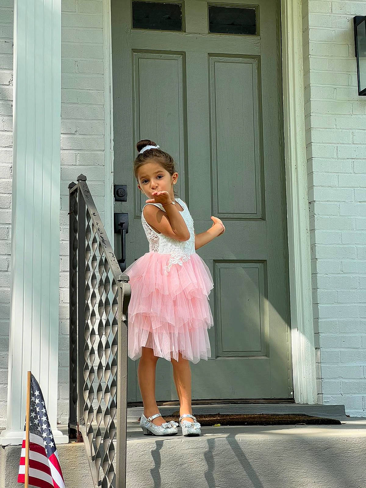 Lina participe au concours pour gagner de l'argent avec cette photo : child, day_dress, door, dress, fashion_design, flag, formal_wear, fun, home_door, house, human_leg, leisure, magenta, pattern, person, pink, shoulder, sitting, toddler, waist