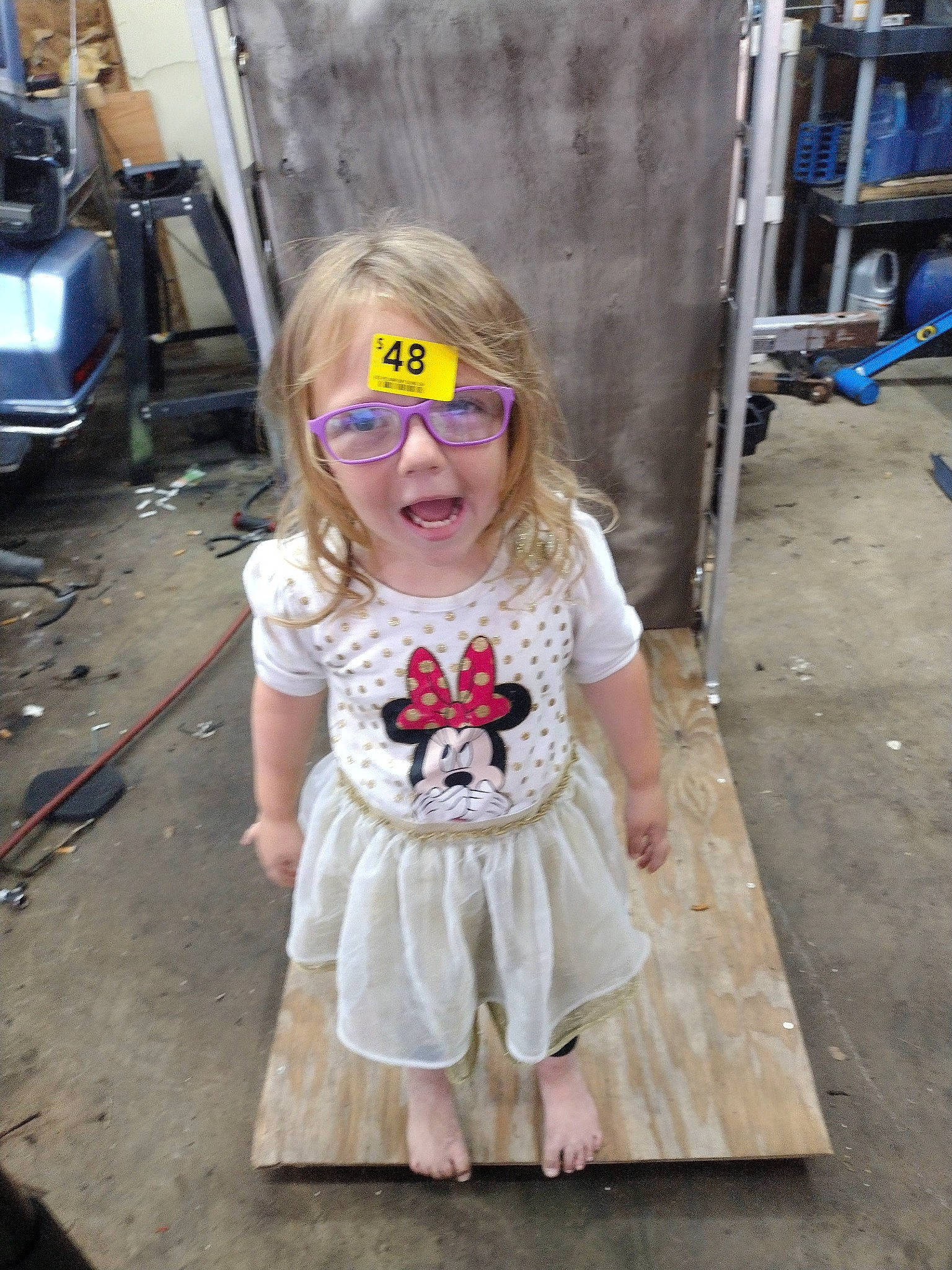 Daisy is registered to the contest to win money with this photo: baby_toddler_clothing, bangs, blond, child, cool, costume, eyewear, fashion_accessory, fashion_design, flooring, fun, magenta, pattern, person, pink, purple, sleeve, t_shirt, television, toddler