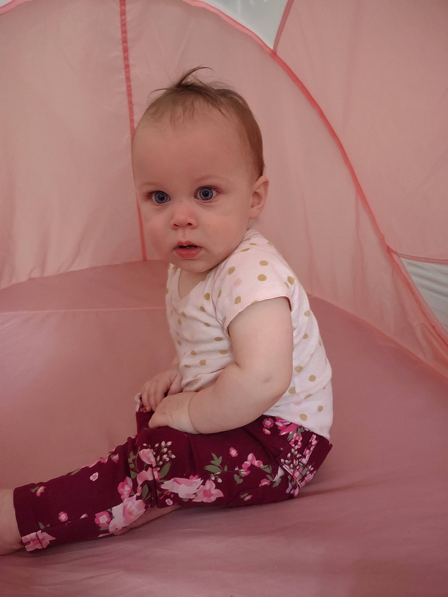 Gracelynn is registered to the contest to win money with this photo: baby, baby_toddler_clothing, cheek, chin, comfort, face, facial_expression, finger, hairstyle, head, human_body, iris, leg, neck, person, pink, shoulder, skin, sleeve, standing