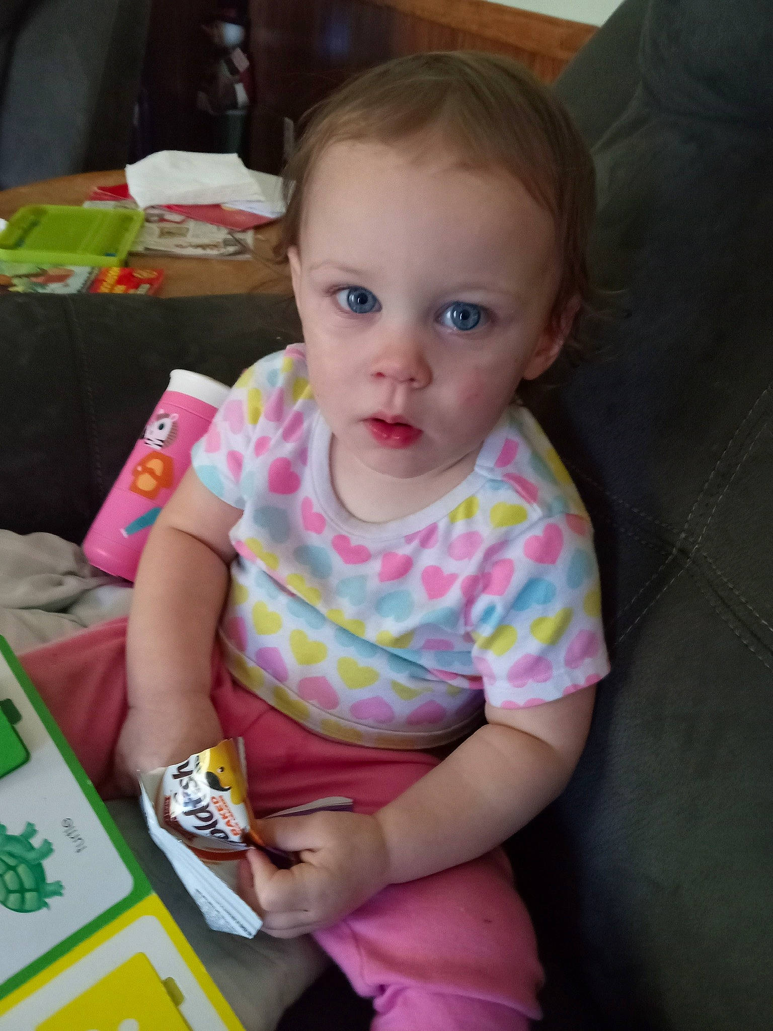 Gracelynn is registered to the contest to win money with this photo: baby, baby_playing_with_toys, baby_products, baby_toddler_clothing, box, cheek, child, flooring, fun, happy, iris, nose, person, play, room, sitting, sleeve, t_shirt, toddler