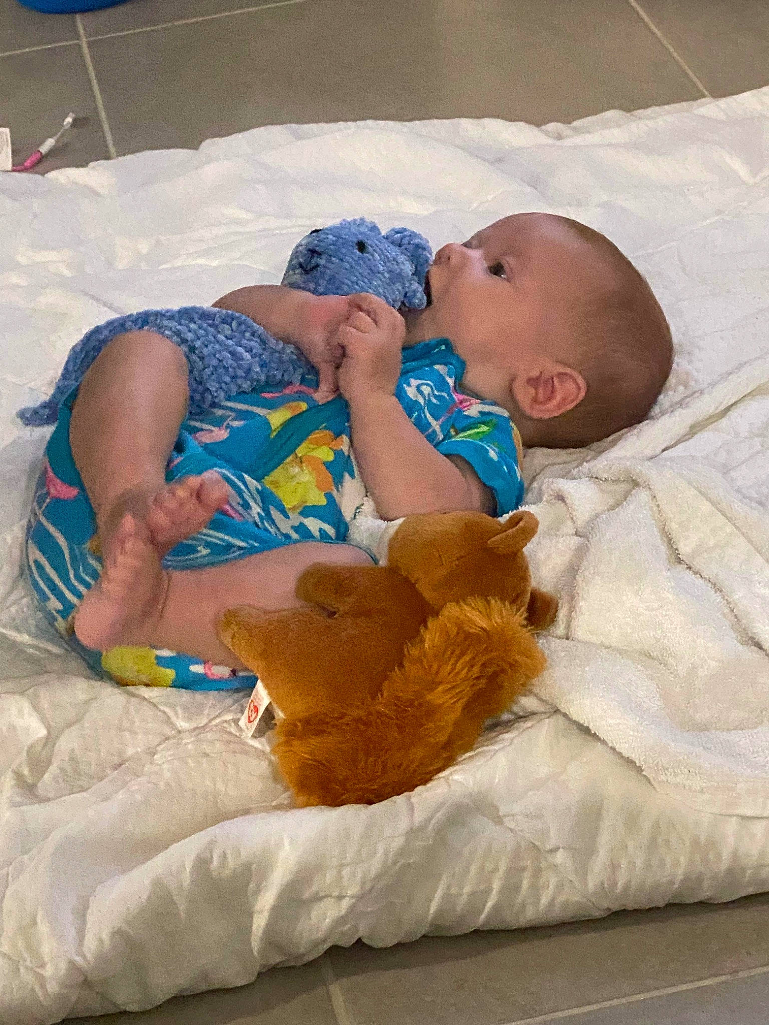 Layton is registered to the contest to win money with this photo: baby, baby_products, baby_toddler_clothing, bedding, bedtime, child, comfort, event, foot, fun, leisure, linens, nap, person, room, shorts, sitting, sleep, toddler, vacation