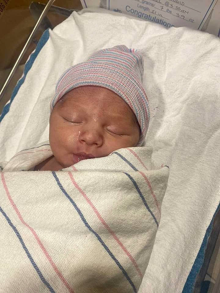 Julian is registered to the contest to win money with this photo: baby, baby_products, baby_sleeping, bedding, bedtime, blanket, child, comfort, headwear, linens, nap, person, room, sleep, toddler