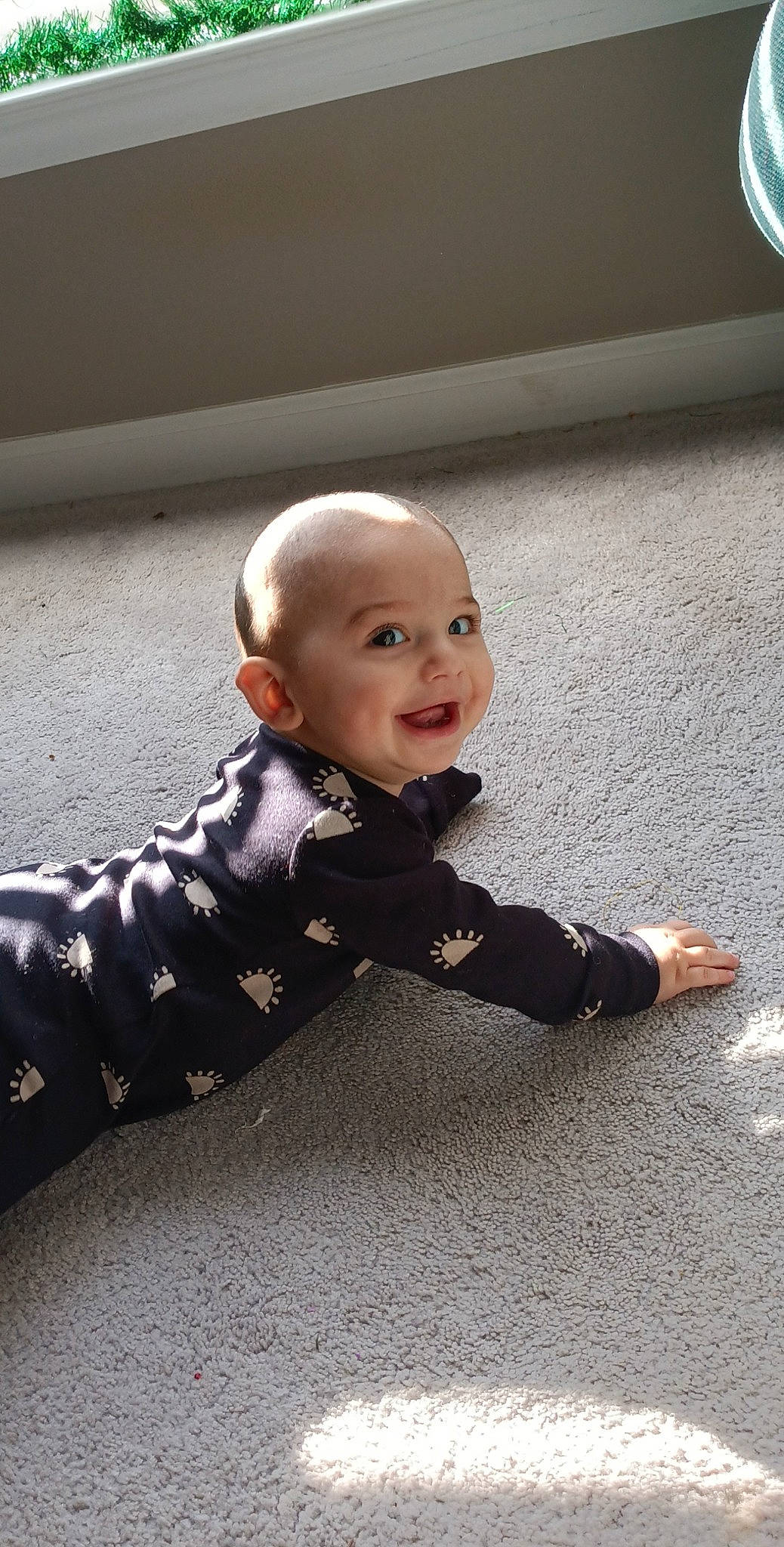Julian is registered to the contest to win money with this photo: asphalt, baby, baby_toddler_clothing, carpet, child, comfort, crawling, flash_photography, floor, flooring, happy, hardwood, pattern, person, road_surface, sitting, sleeve, smile, suit, toddler