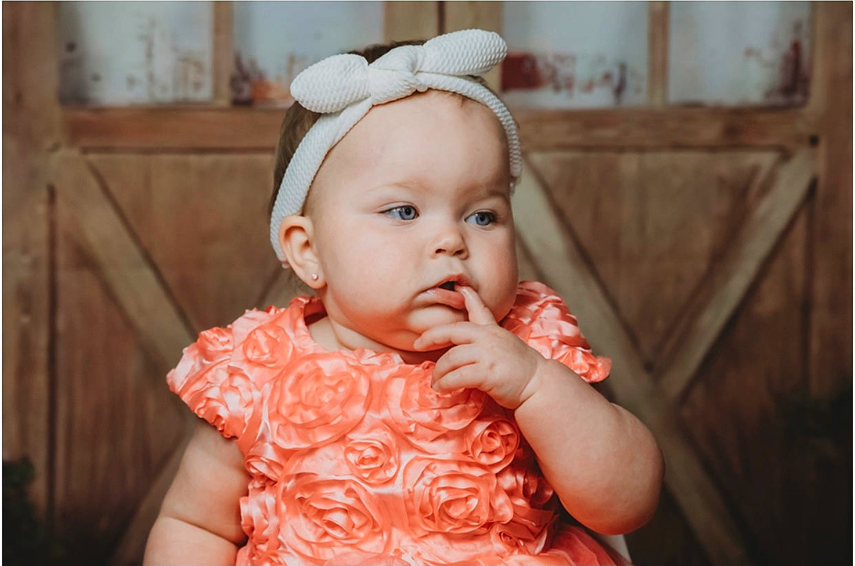 Kaizley is registered to the contest to win money with this photo: baby, baby_toddler_clothing, cheek, chin, dress, ear, eye, eyelash, flash_photography, happy, headband, headpiece, headwear, human_body, iris, jewellery, lip, neck, nose, person