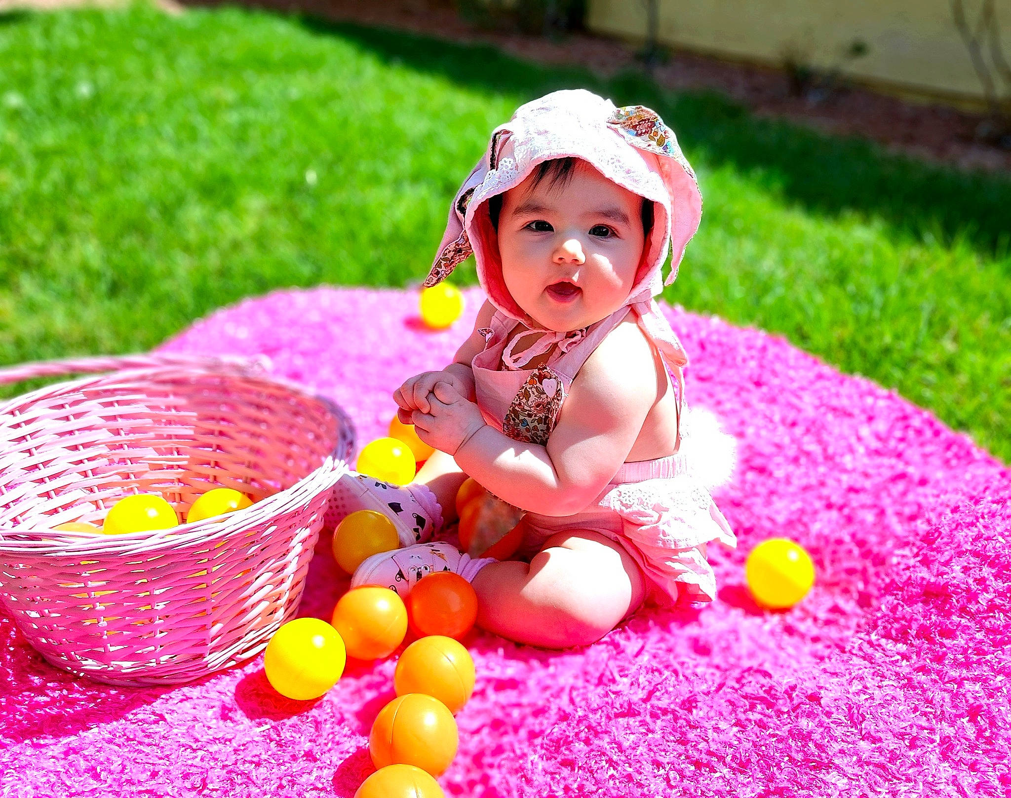 Avalyn is registered to the contest to win money with this photo: baby, baby_toddler_clothing, basket, child, easter, event, fun, grass, happy, hat, headwear, leisure, magenta, people_in_nature, person, petal, pink, plant, recreation, toddler