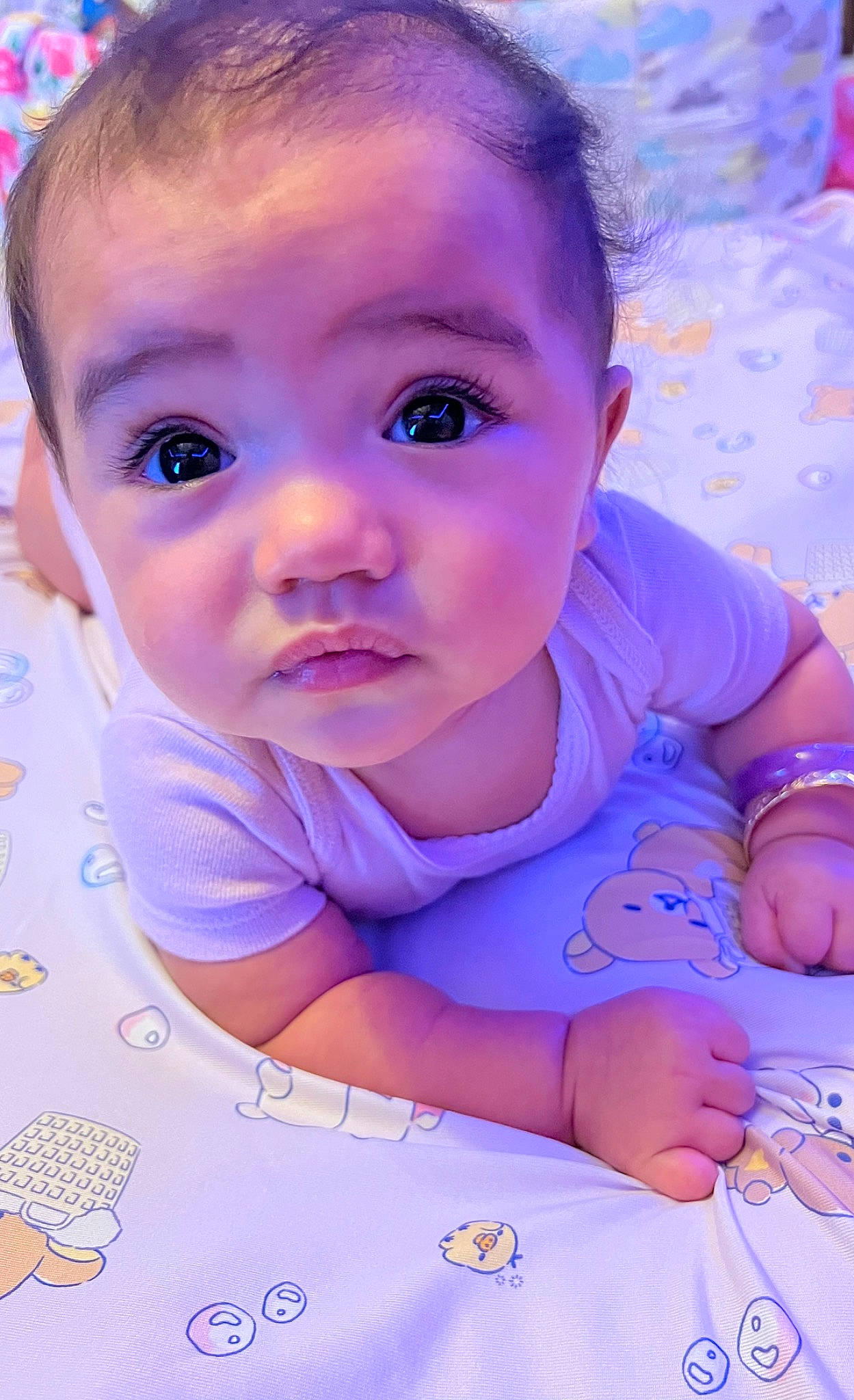 Jem is registered to the contest to win money with this photo: azure, baby, baby_toddler_clothing, blue, cheek, child, electric_blue, eyelash, flash_photography, fun, hairstyle, happy, iris, mouth, nose, person, pink, purple, skin, toddler