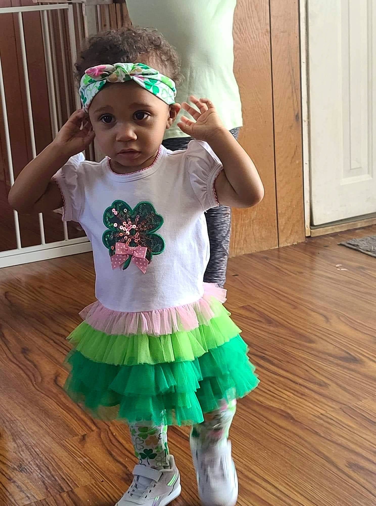 Sariyah is registered to the contest to win money with this photo: baby_toddler_clothing, ballet_tutu, child, cool, event, fun, green, happy, hardwood, headgear, headwear, magenta, pattern, person, pink, purple, ruffle, sleeve, t_shirt, toddler