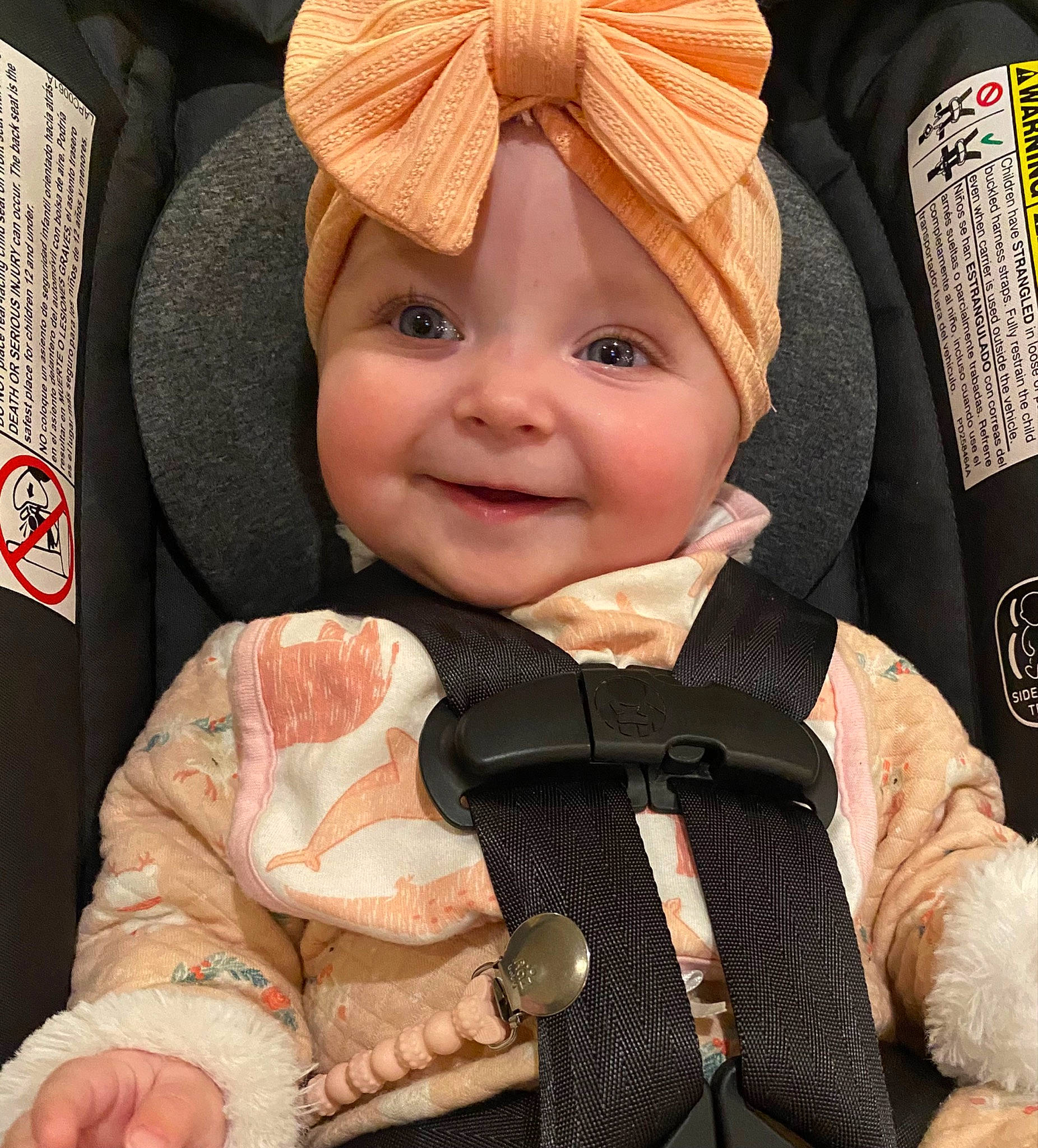 Alana joined the competition — help win amazing prizes! baby, baby_carriage, baby_carrier, baby_products, baby_toddler_clothing, car_seat, cheek, child, comfort, face, fashion_accessory, gesture, happy, headwear, joy, outerwear, person, skin, sleeve, smile