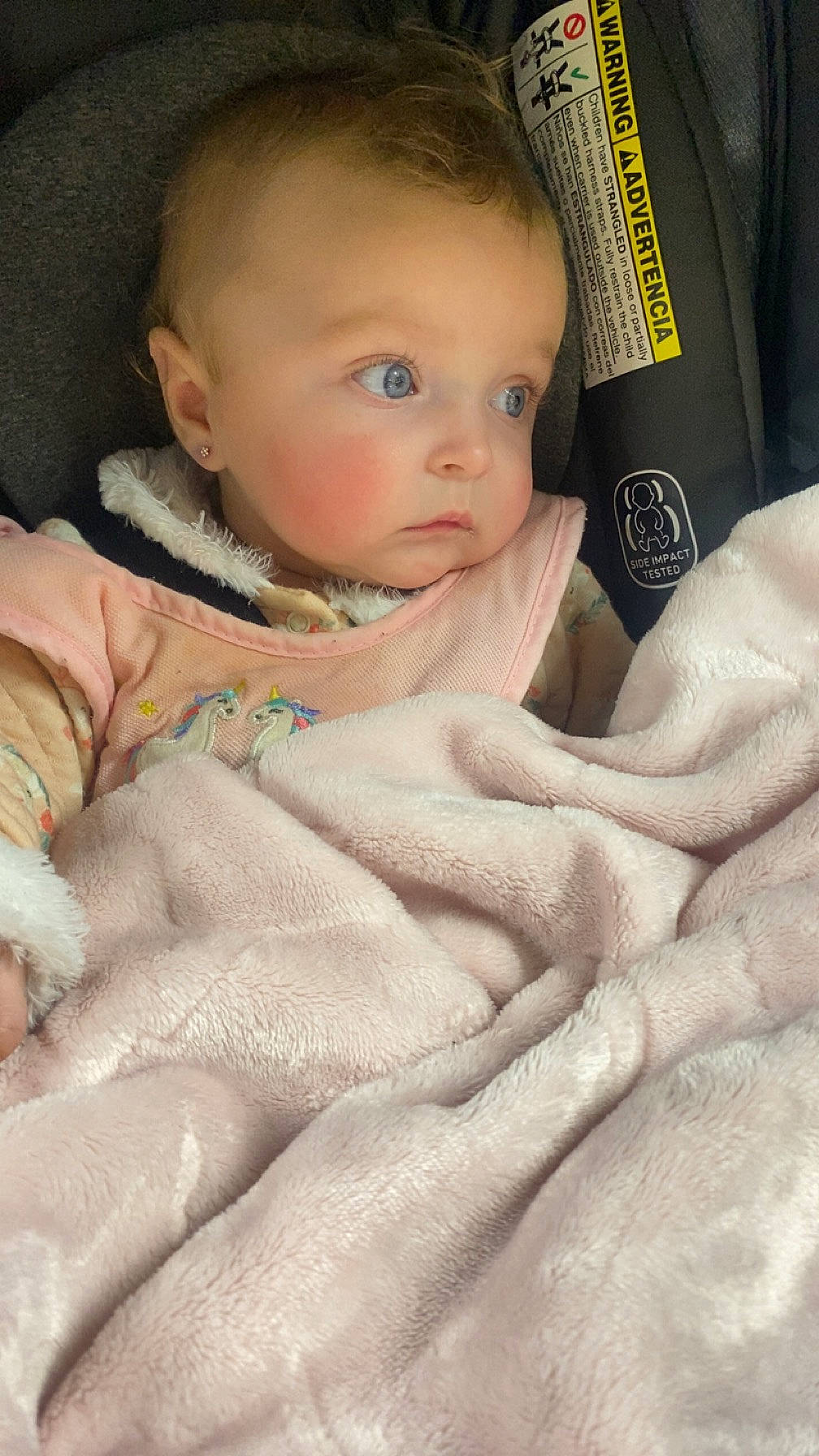 Alana is registered to the contest to win money with this photo: baby, baby_products, baby_toddler_clothing, bedding, car_seat, cheek, child, comfort, linens, nail, pattern, peach, person, product, room, sitting, skin, textile, thumb, toddler