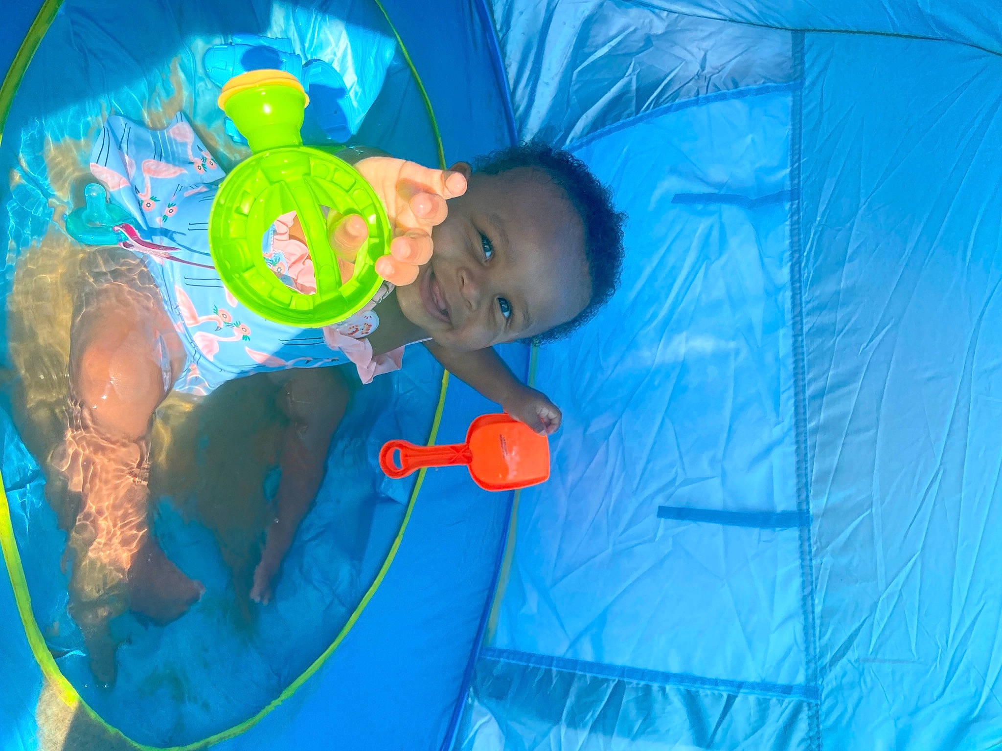 Luna joined the competition — help win amazing prizes! aqua, azure, baby, baby_toddler_clothing, blue, child, circle, electric_blue, fun, happy, inflatable, joy, leisure, person, play, recreation, smile, t_shirt, toddler, toy