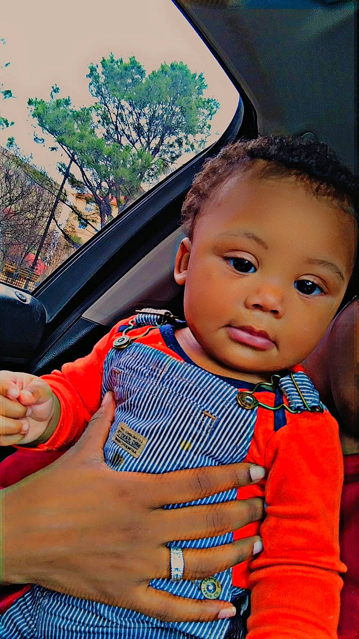 Aydrien joined the competition — help win amazing prizes! baby, baby_toddler_clothing, child, electric_blue, finger, fun, gesture, hand, happy, leisure, luxury_vehicle, nose, person, recreation, sitting, thumb, toddler, travel, tree, vacation