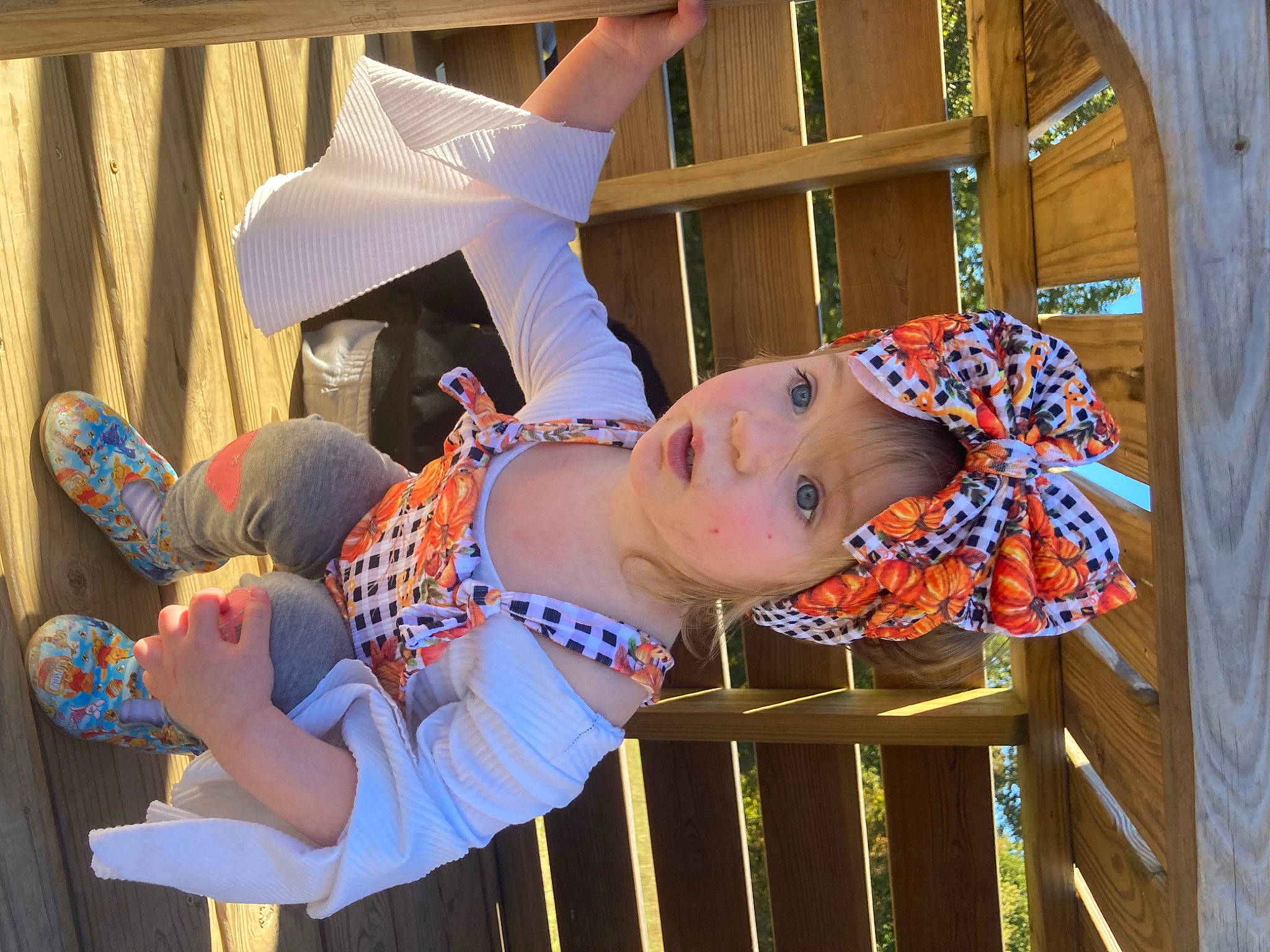 Alivia is registered to the contest to win money with this photo: abdomen, child, costume, electric_blue, entertainment, event, fun, happy, hat, headwear, leisure, pattern, performing_arts, person, sandal, smile, sunglasses, toddler, wood