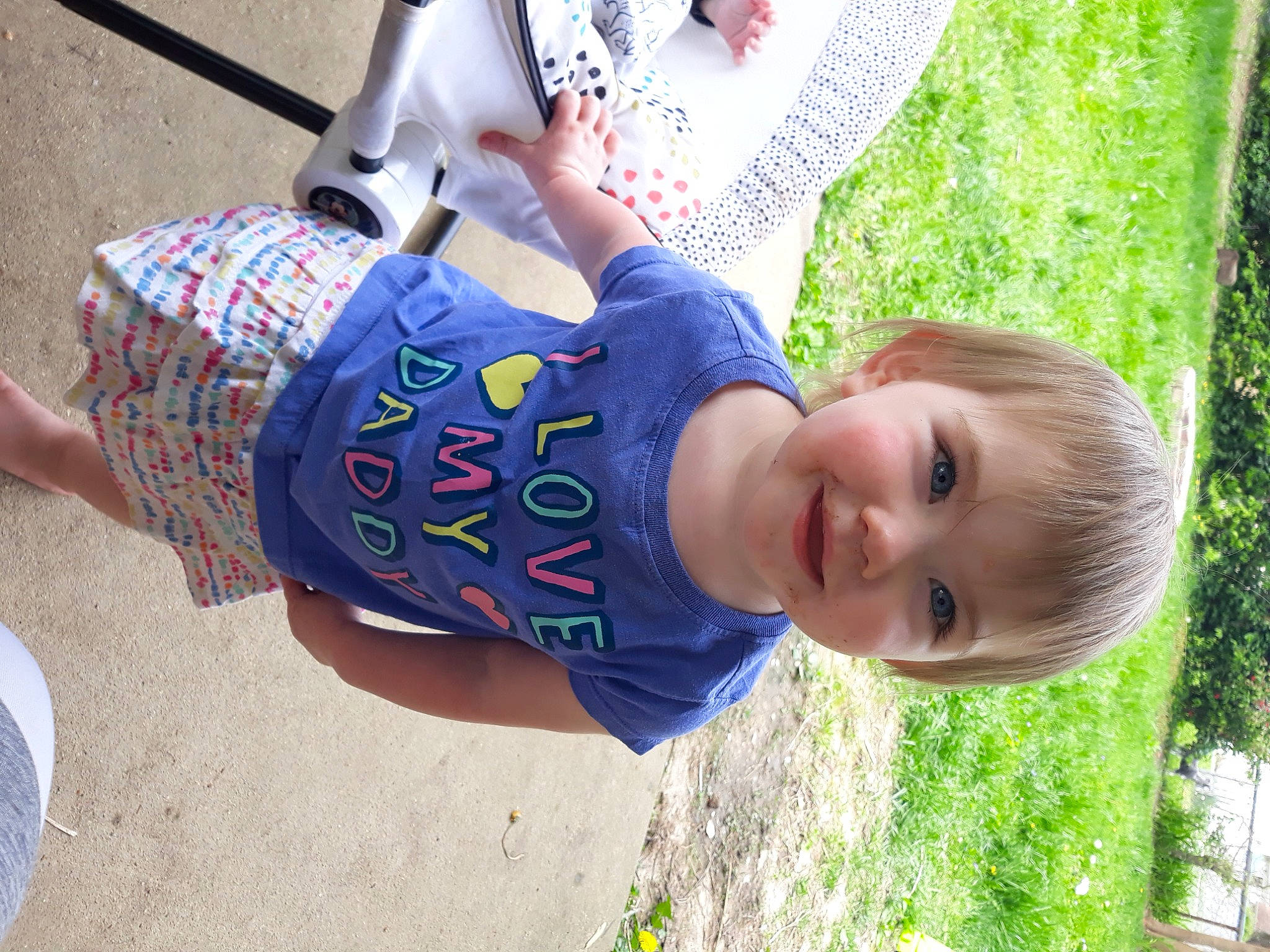 Arya is registered to the contest to win money with this photo: baby, baby_toddler_clothing, child, fun, grass, happy, hat, human_leg, joy, leisure, pattern, people_in_nature, person, plant, play, recreation, sitting, smile, summer, thigh