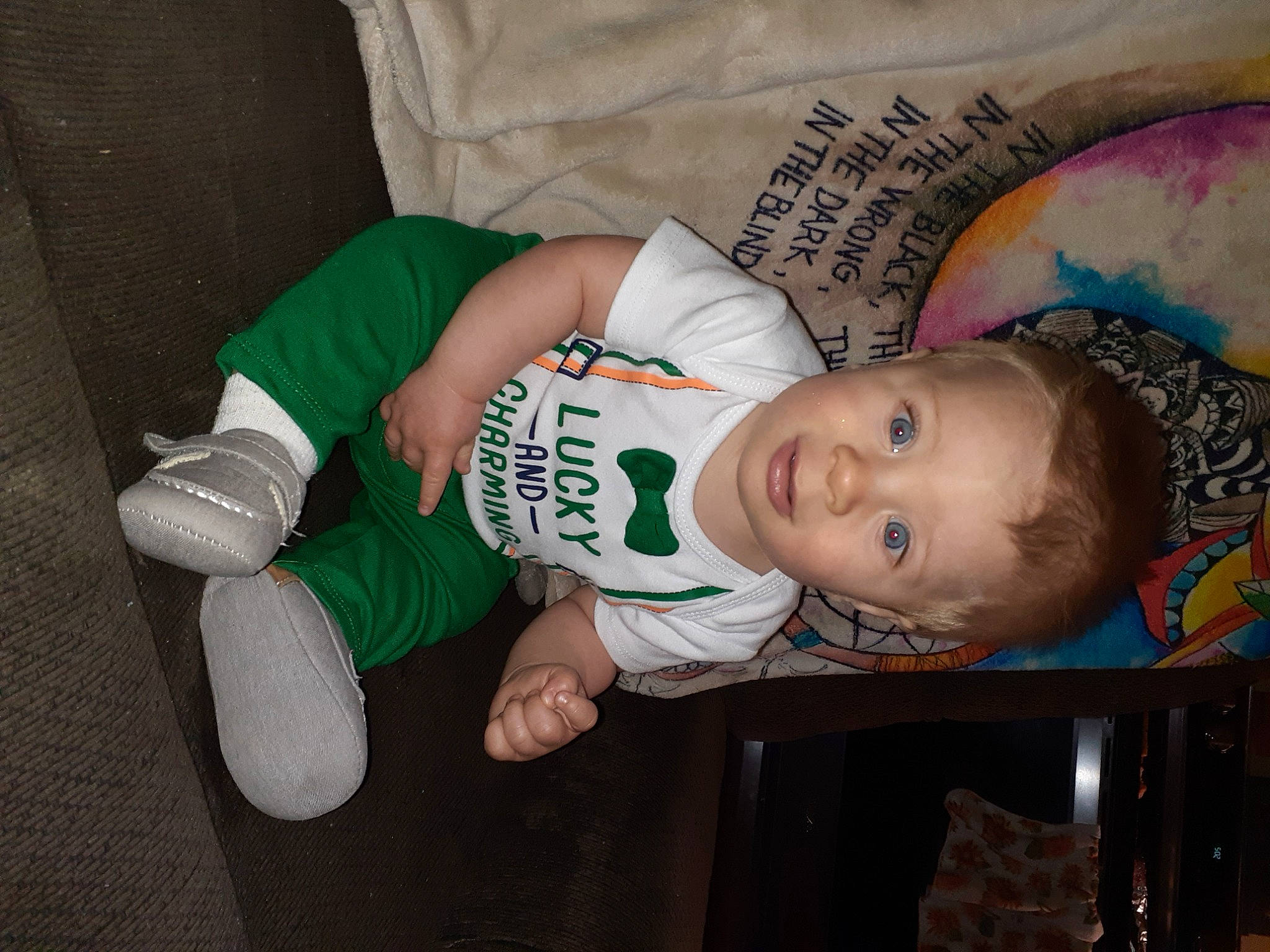 Shiloh is registered to the contest to win money with this photo: art, baby, baby_products, baby_toddler_clothing, cheek, child, comfort, finger, fun, happy, human_body, knee, mouth, person, room, sitting, sleeve, sock, t_shirt, toddler