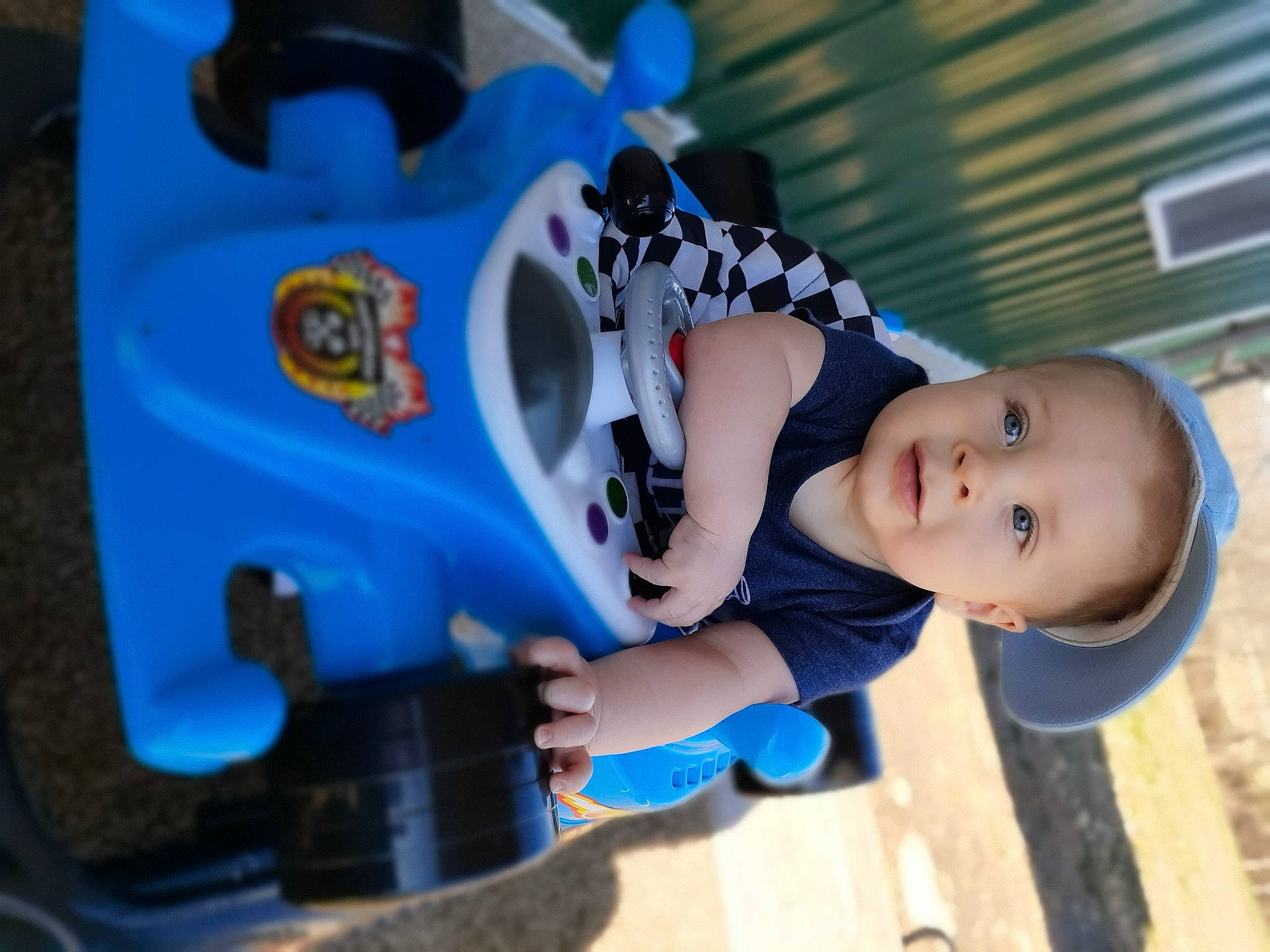 Shiloh joined the competition — help win amazing prizes! azure, baby, baby_products, baby_toddler_clothing, child, electric_blue, fun, happy, human_body, leisure, person, personal_protective_equipment, plant, play, recreation, sitting, sock, toddler, toy, wheel