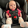baby, child, car_seat, seat_belt, pink_shirt, socks, infant, smile, face, head, sitting, safety, restraint, cute, indoor, clothing, person, young_child, comfort, car_interior