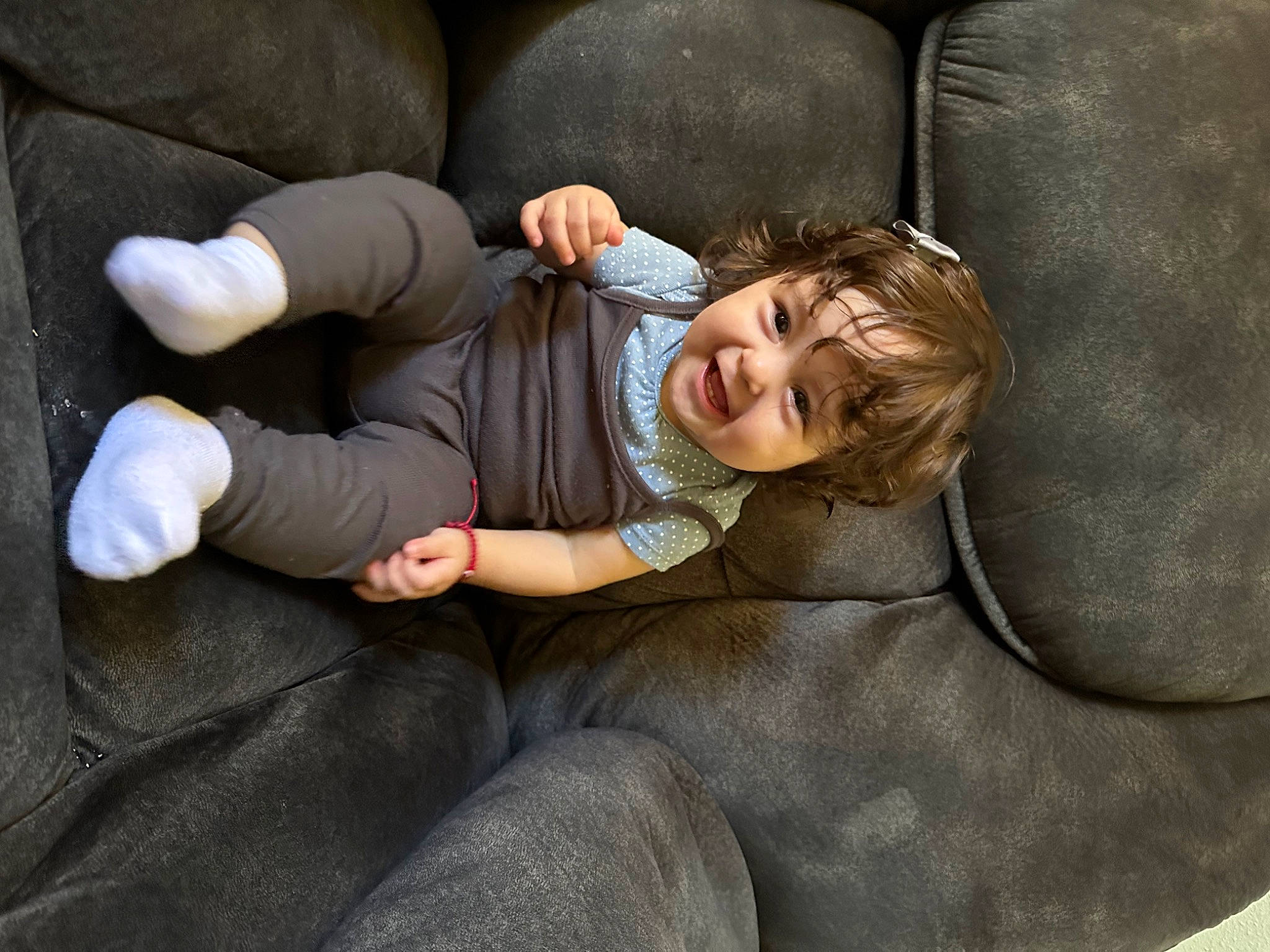Emilia joined the competition — help win amazing prizes! car_seat, child, comfort, couch, foot, fun, fur, gesture, hand, happy, human_body, human_leg, joy, lap, linens, nap, person, sitting, sleep, smile