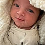 Ishaq participe au concours pour gagner de l'argent avec cette photo : baby, blanket, face, infant, clothing, smile, portrait, cozy, soft, warm, cute, child, newborn, wrapped, comfort, sleepwear, closeup, expression, indoors, infancy