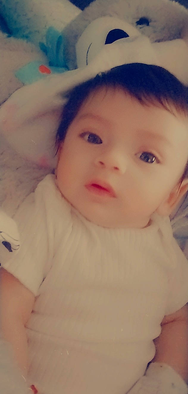 Ezekiel is registered to the contest to win money with this photo: baby, cheek, chin, ear, eye, eyebrow, eyelash, forehead, happy, iris, jaw, lip, mouth, neck, nose, person, product, skin, sleeve, smile