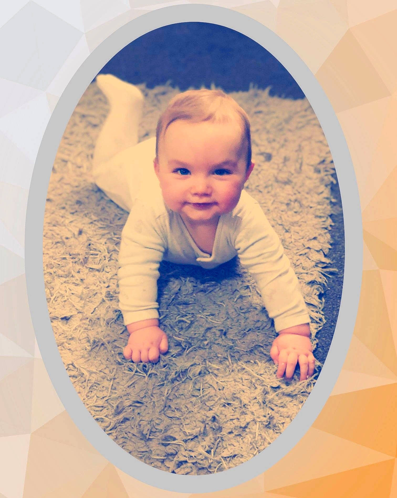 Blake is registered to the contest to win money with this photo: art, baby, baby_toddler_clothing, beauty, cheek, child, circle, facial_expression, floor, flooring, fun, hairstyle, happy, nose, people_in_nature, person, product, sleeve, space, tints_and_shades