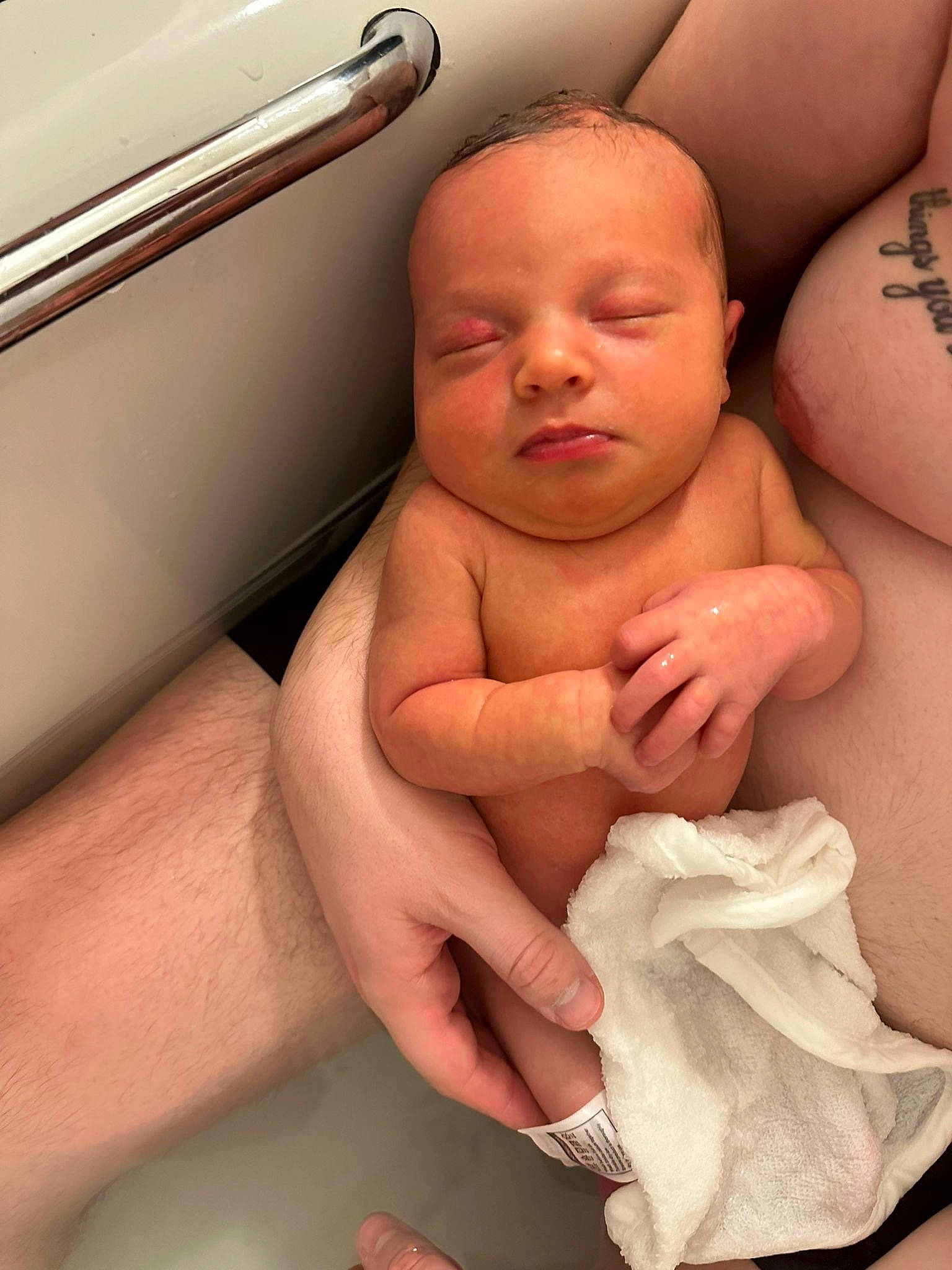 Isabella is registered to the contest to win money with this photo: arm, baby, cheek, chest, comfort, finger, gesture, hand, human_body, joint, leg, mouth, muscle, nail, neck, nose, person, shoulder, skin, stomach