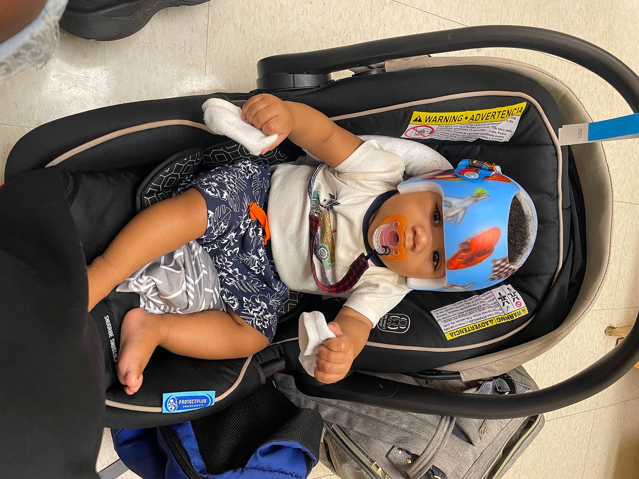 Noel joined the competition — help win amazing prizes! audio_equipment, auto_part, automotive_design, automotive_exterior, baby, baby_carriage, baby_in_car_seat, baby_products, bag, car_seat, child, comfort, headwear, human_leg, knee, lap, motor_vehicle, person, personal_protective_equipment, thigh