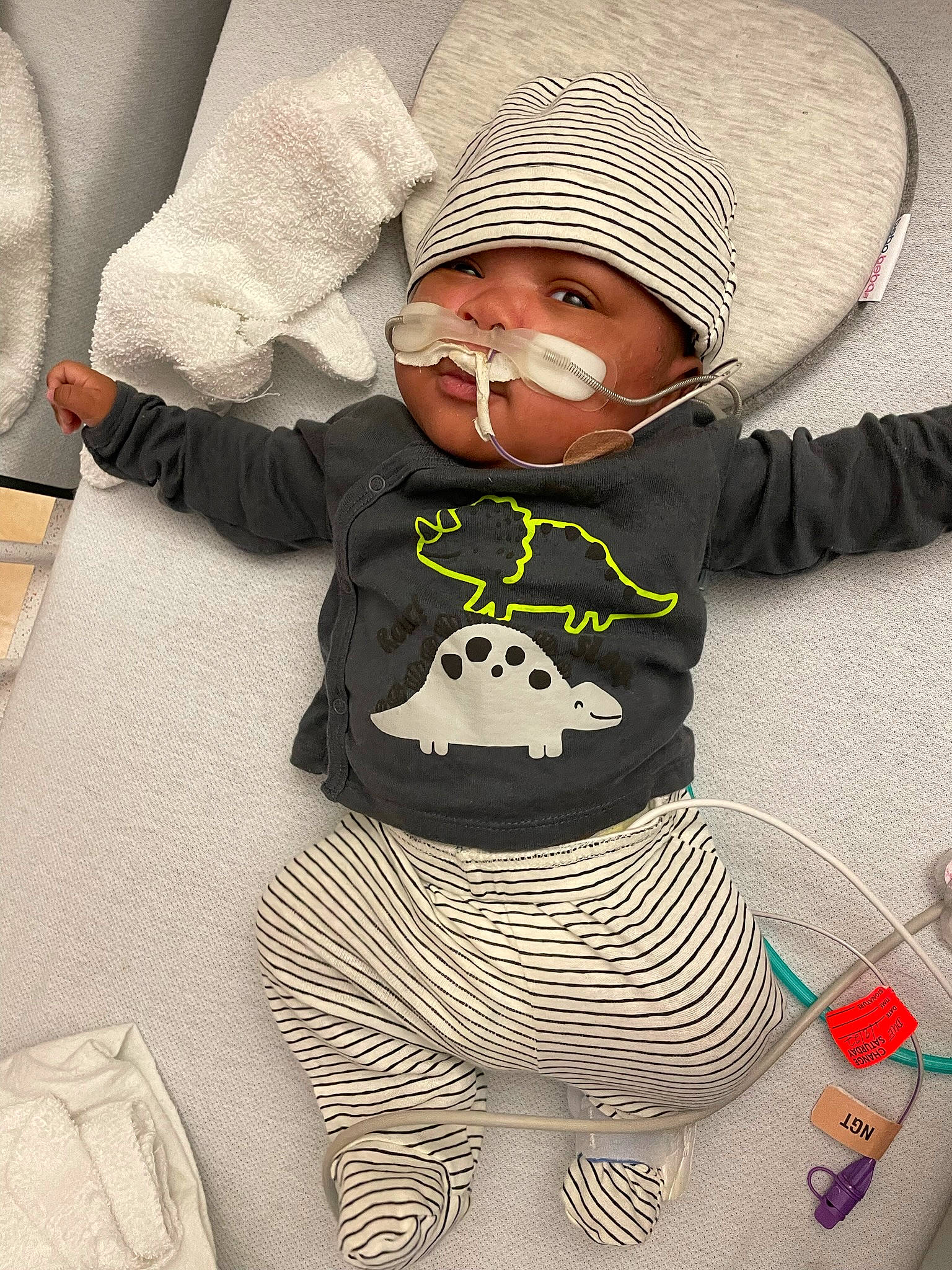 Noel joined the competition — help win amazing prizes! baby, baby_products, baby_sleeping, baby_toddler_clothing, cap, child, comfort, costume_hat, fashion_accessory, hat, headgear, headwear, knit_cap, outerwear, pattern, person, sitting, sleeve, sun_hat, t_shirt