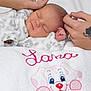 Lana participe au concours pour gagner de l'argent avec cette photo : baby_products, bed, bedtime, blanket, child, finger, girl, hand, infant, mother, nose, product, skin, sleep, smile, textile, toddler