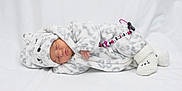 Lana participe au concours pour gagner de l'argent avec cette photo : child, infant, material, product, stuffed_toy, textile, toddler, white