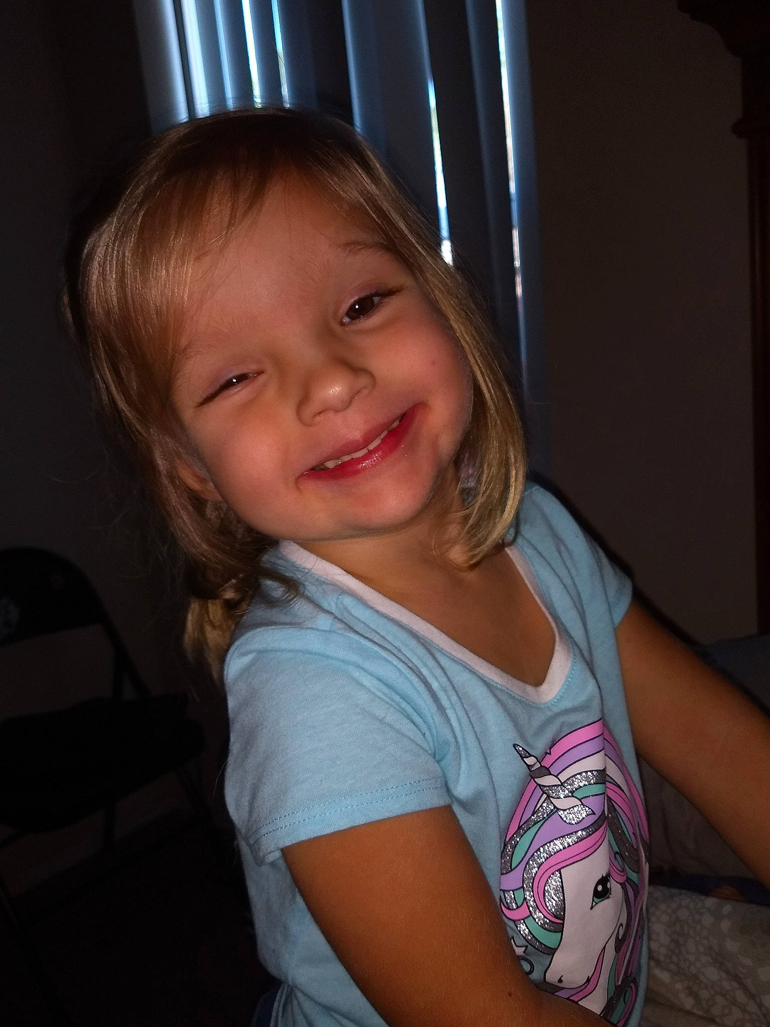 Catherine is registered to the contest to win money with this photo: arm, beauty, blond, cheek, child, day, emotion, eye, face, facial_expression, fun, girl, hair, hairstyle, human_body, human_hair_color, joy, nose, person, sitting