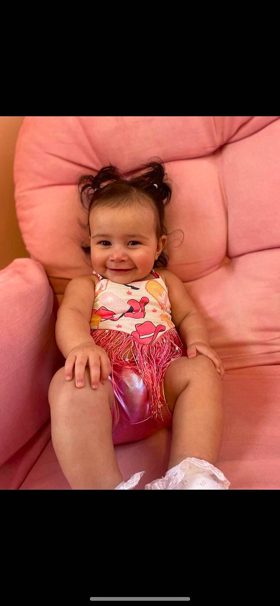 Adalyn is registered to the contest to win money with this photo: baby, baby_toddler_clothing, comfort, eye, face, finger, flash_photography, happy, head, human_body, joy, knee, muscle, person, pink, skin, smile, stomach, thigh, thumb