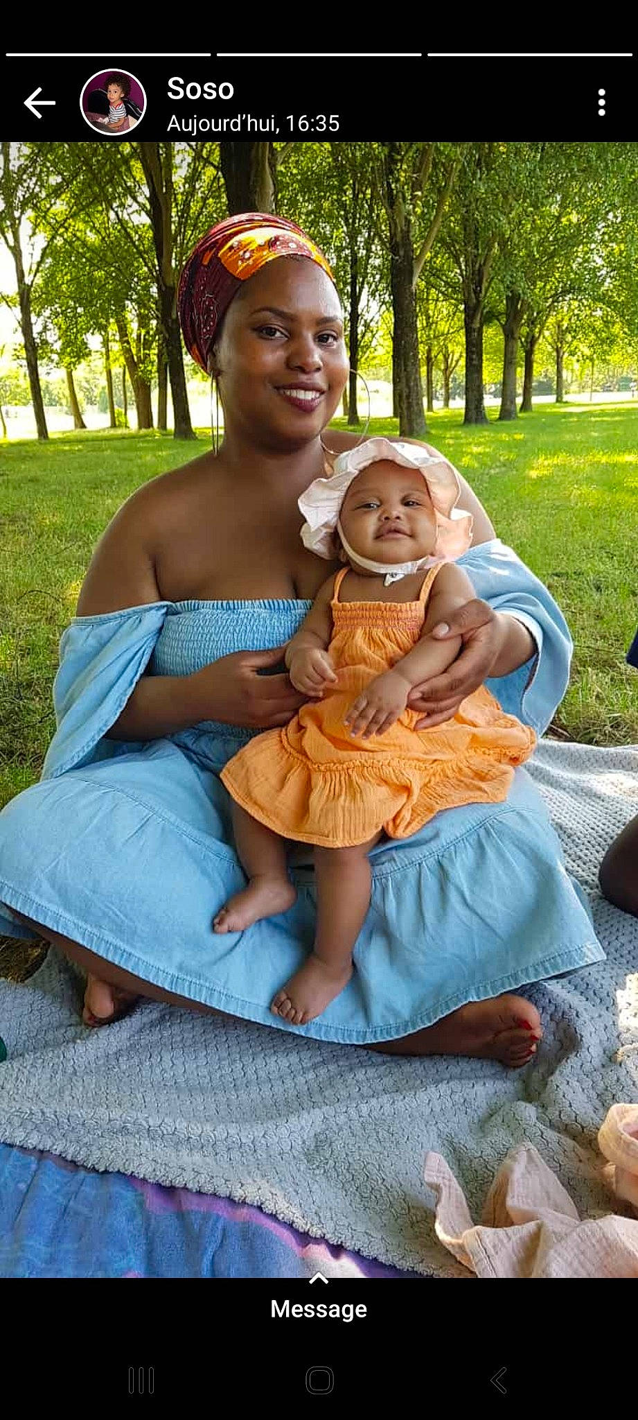 Emy a rejoint le concours — aidez-le/la à gagner de superbes lots ! baby, child, dress, event, eye, fun, grass, green, happy, head, headwear, joy, leisure, people, people_in_nature, person, photograph, plant, recreation, smile